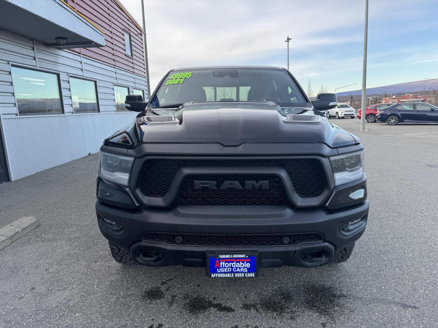 2021 BLACK RAM 1500 Rebel Crew Cab 4WD (1C6SRFLT6MN) with an 5.7L V8 OHV 16V engine, 8A transmission, located at 1960 Industrial Drive, Wasilla, 99654, (907) 274-2277, 61.573475, -149.400146 - Photo#1