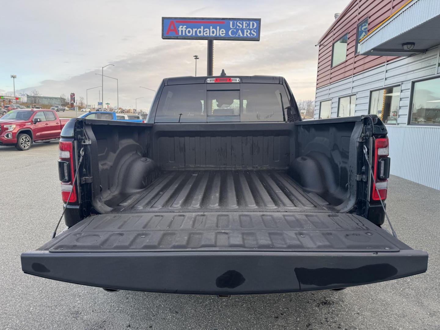 2021 BLACK RAM 1500 Rebel Crew Cab 4WD (1C6SRFLT6MN) with an 5.7L V8 OHV 16V engine, 8A transmission, located at 1960 Industrial Drive, Wasilla, 99654, (907) 274-2277, 61.573475, -149.400146 - Photo#7