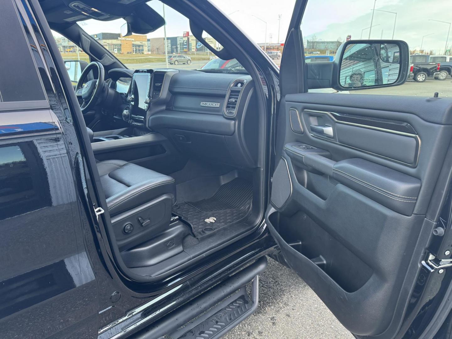 2021 BLACK RAM 1500 Rebel Crew Cab 4WD (1C6SRFLT6MN) with an 5.7L V8 OHV 16V engine, 8A transmission, located at 1960 Industrial Drive, Wasilla, 99654, (907) 274-2277, 61.573475, -149.400146 - Photo#12