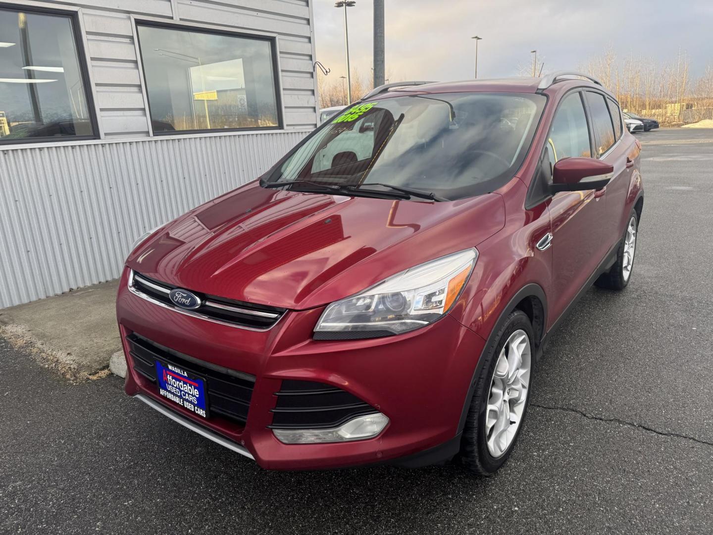 2015 RED Ford Escape Titanium 4WD (1FMCU9JX2FU) with an 1.6L L4 DOHC 16V engine, 6-Speed Automatic transmission, located at 1960 Industrial Drive, Wasilla, 99654, (907) 274-2277, 61.573475, -149.400146 - Photo#0