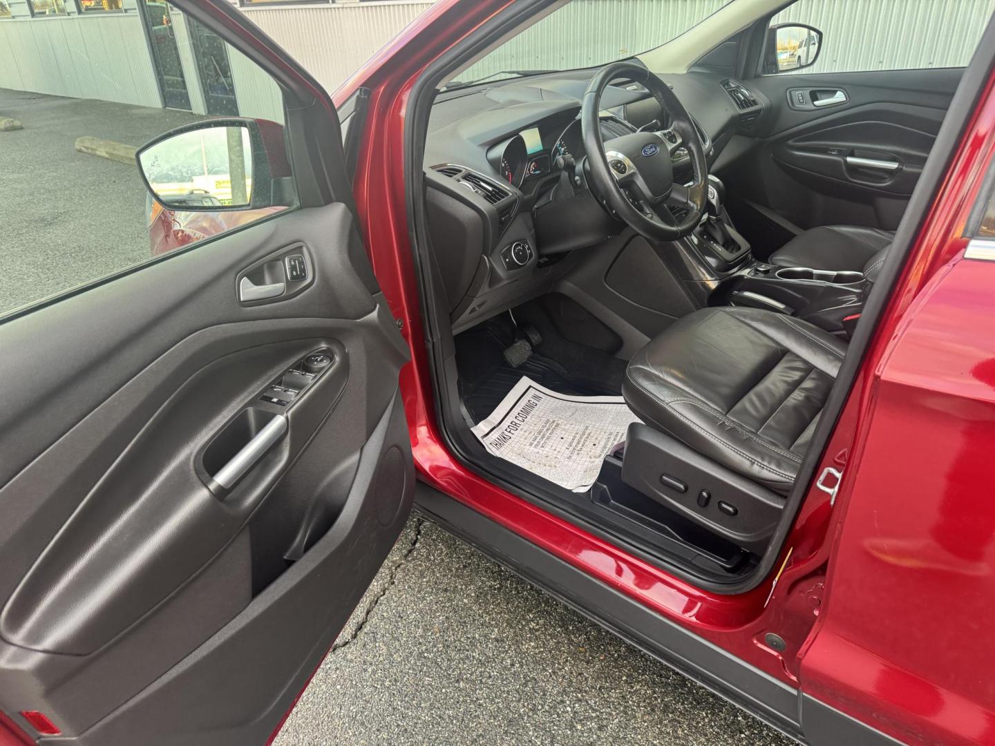 2015 RED Ford Escape Titanium 4WD (1FMCU9JX2FU) with an 1.6L L4 DOHC 16V engine, 6-Speed Automatic transmission, located at 1960 Industrial Drive, Wasilla, 99654, (907) 274-2277, 61.573475, -149.400146 - Photo#4