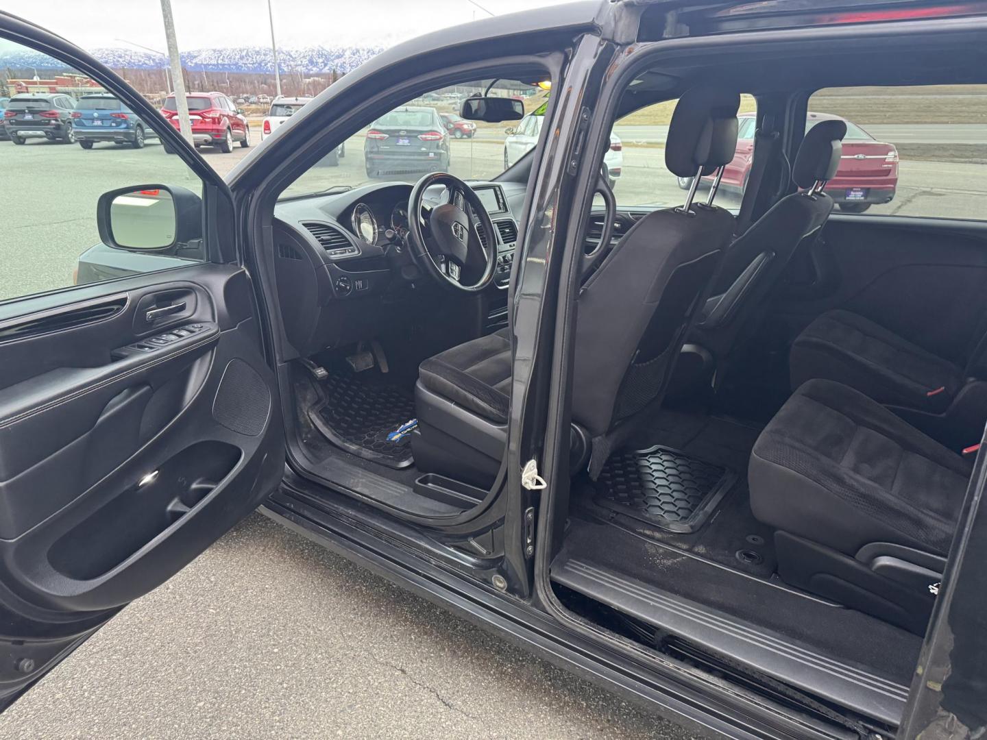 2018 BLACK Dodge Grand Caravan SE (2C4RDGBG5JR) with an 3.6L V6 DOHC 24V engine, 6A transmission, located at 1960 Industrial Drive, Wasilla, 99654, (907) 274-2277, 61.573475, -149.400146 - Photo#6