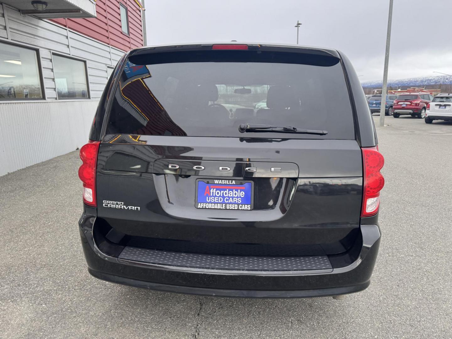 2018 BLACK Dodge Grand Caravan SE (2C4RDGBG5JR) with an 3.6L V6 DOHC 24V engine, 6A transmission, located at 1960 Industrial Drive, Wasilla, 99654, (907) 274-2277, 61.573475, -149.400146 - Photo#4