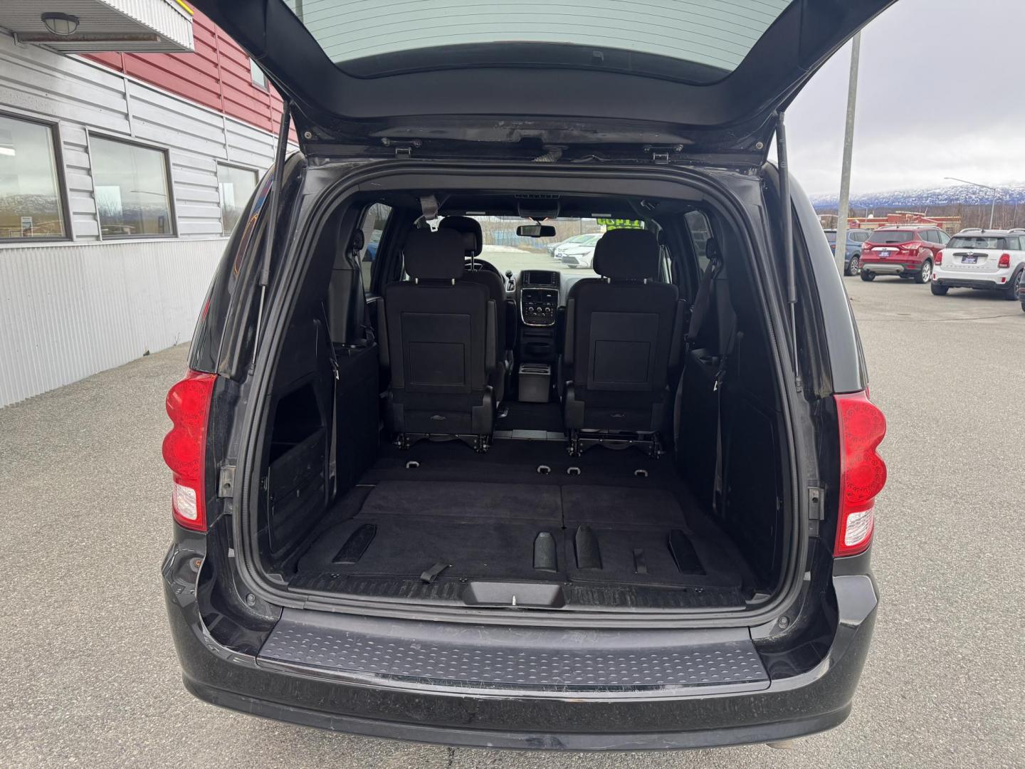 2018 BLACK Dodge Grand Caravan SE (2C4RDGBG5JR) with an 3.6L V6 DOHC 24V engine, 6A transmission, located at 1960 Industrial Drive, Wasilla, 99654, (907) 274-2277, 61.573475, -149.400146 - Photo#14