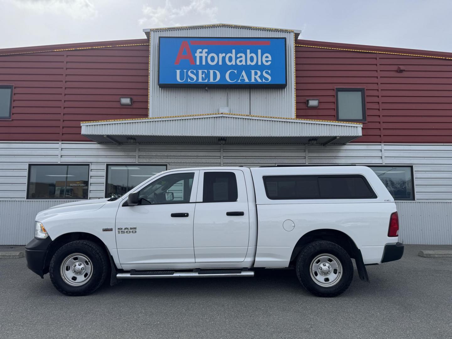 2016 WHITE RAM 1500 Tradesman Quad Cab 4WD (1C6RR7FT9GS) with an 5.7L V8 OHV 16V engine, 6A transmission, located at 1960 Industrial Drive, Wasilla, 99654, (907) 274-2277, 61.573475, -149.400146 - Photo#1