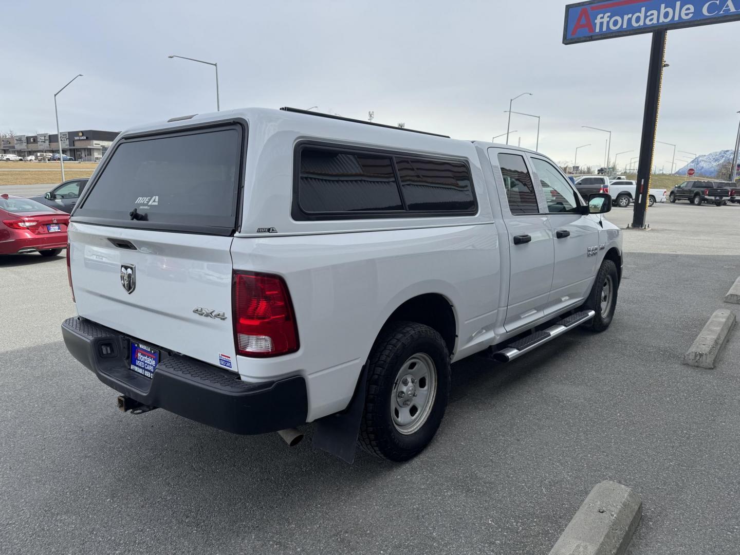 2016 WHITE RAM 1500 Tradesman Quad Cab 4WD (1C6RR7FT9GS) with an 5.7L V8 OHV 16V engine, 6A transmission, located at 1960 Industrial Drive, Wasilla, 99654, (907) 274-2277, 61.573475, -149.400146 - Photo#3