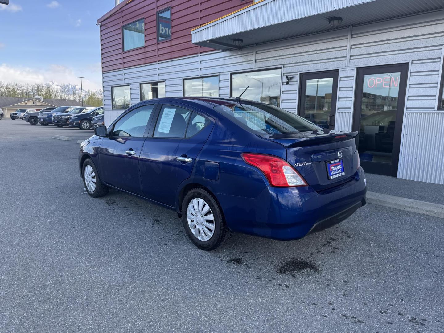 2019 BLUE Nissan Versa 1.6 SV Sedan (3N1CN7AP3KL) with an 1.6L L4 DOHC 16V engine, CVT transmission, located at 1960 Industrial Drive, Wasilla, 99654, (907) 274-2277, 61.573475, -149.400146 - Photo#2