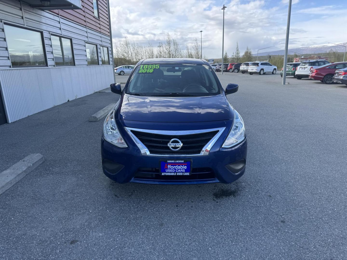 2019 BLUE Nissan Versa 1.6 SV Sedan (3N1CN7AP3KL) with an 1.6L L4 DOHC 16V engine, CVT transmission, located at 1960 Industrial Drive, Wasilla, 99654, (907) 274-2277, 61.573475, -149.400146 - Photo#1