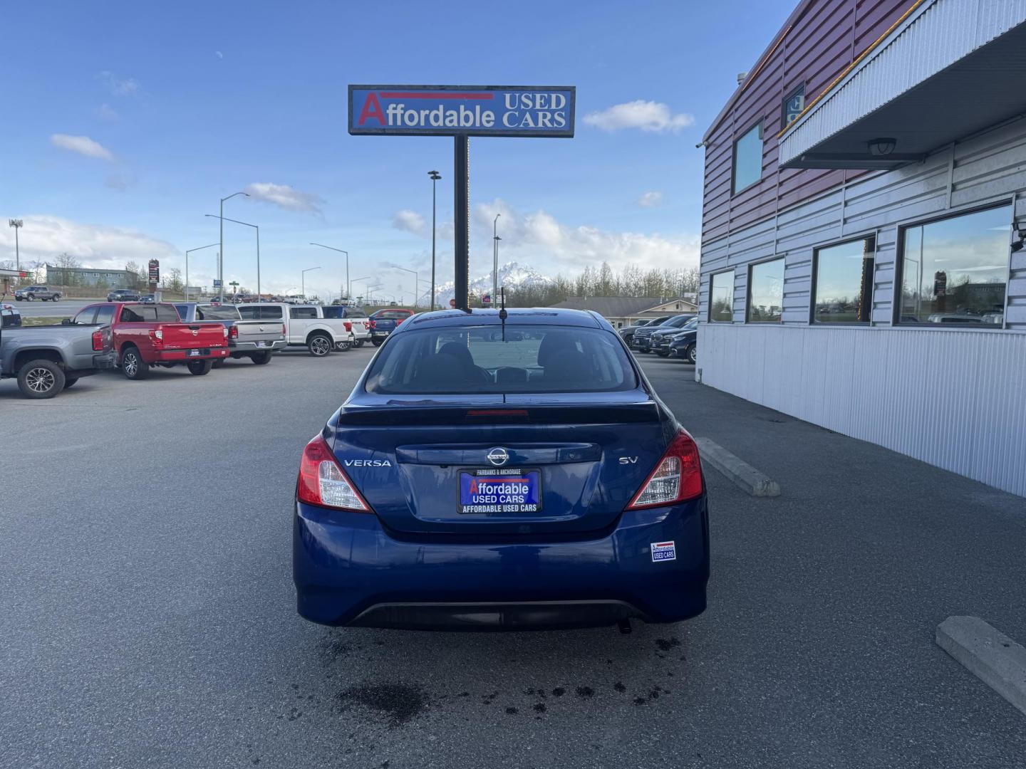 2019 BLUE Nissan Versa 1.6 SV Sedan (3N1CN7AP3KL) with an 1.6L L4 DOHC 16V engine, CVT transmission, located at 1960 Industrial Drive, Wasilla, 99654, (907) 274-2277, 61.573475, -149.400146 - Photo#3