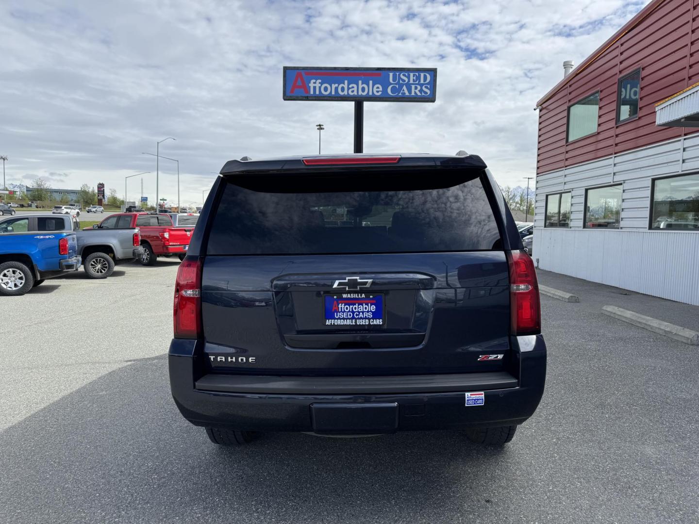2017 BLUE Chevrolet Tahoe LT Z71 4WD (1GNSKBKC1HR) with an 5.3L V8 OHV 16V engine, 6A transmission, located at 1960 Industrial Drive, Wasilla, 99654, (907) 274-2277, 61.573475, -149.400146 - Photo#2