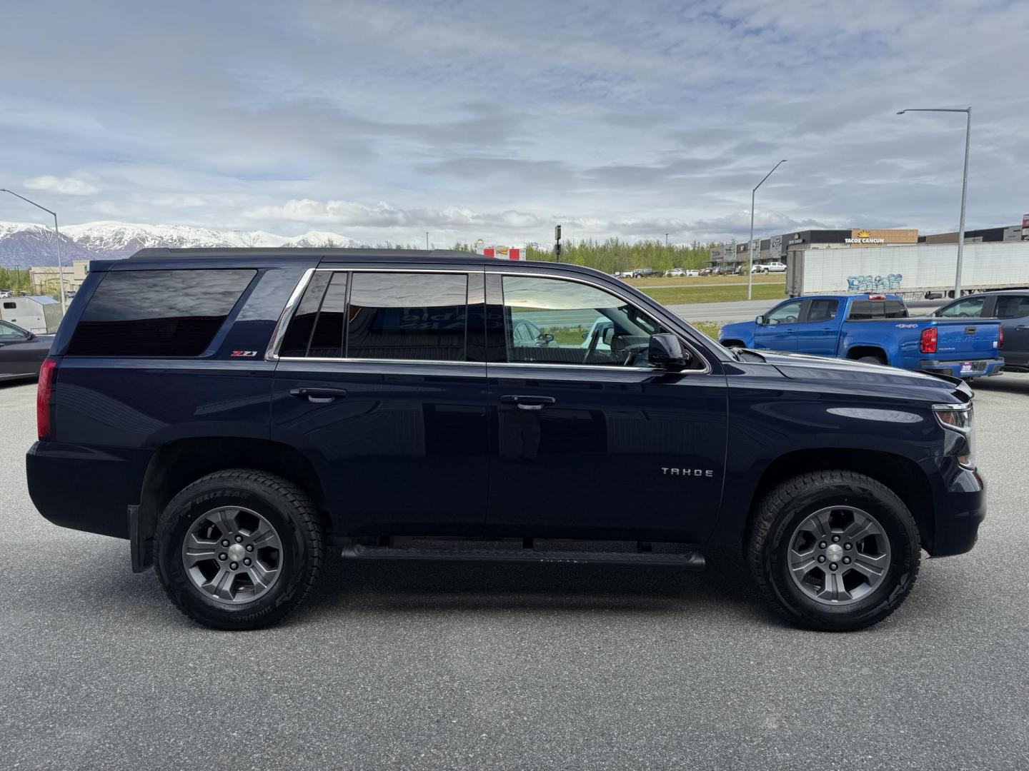 2017 BLUE Chevrolet Tahoe LT Z71 4WD (1GNSKBKC1HR) with an 5.3L V8 OHV 16V engine, 6A transmission, located at 1960 Industrial Drive, Wasilla, 99654, (907) 274-2277, 61.573475, -149.400146 - Photo#4