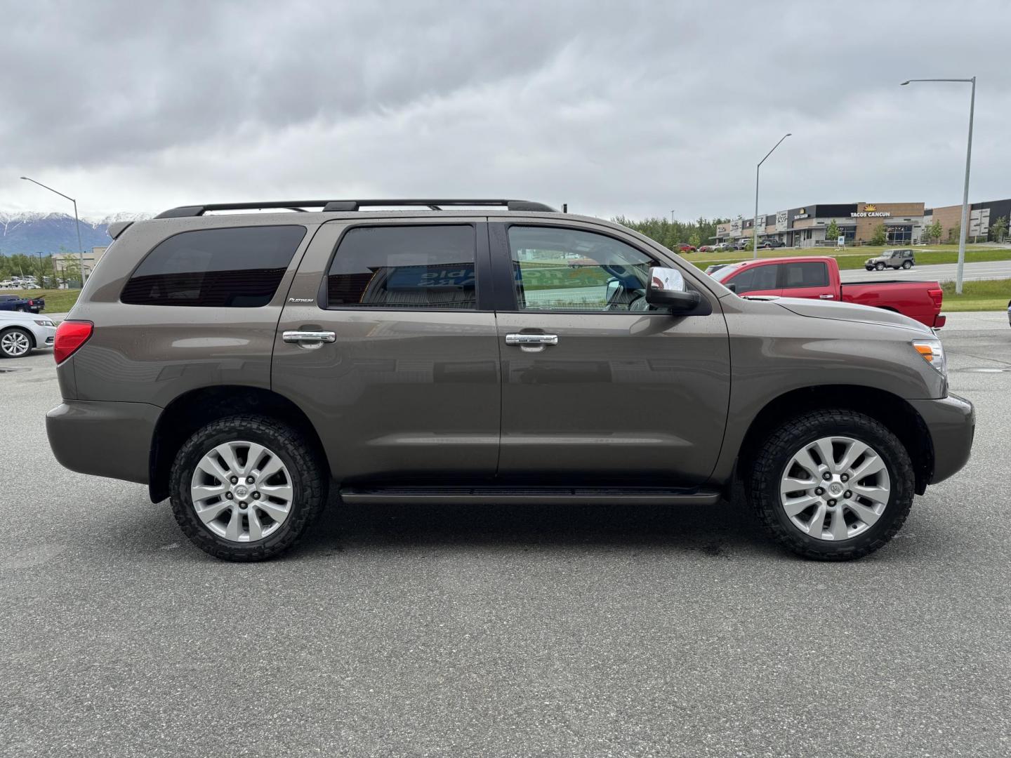 2017 GREEN TOYOTA SEQUOIA PLATINUM (5TDDY5G14HS) with an 5.7L engine, Automatic transmission, located at 1960 Industrial Drive, Wasilla, 99654, (907) 274-2277, 61.573475, -149.400146 - Photo#4