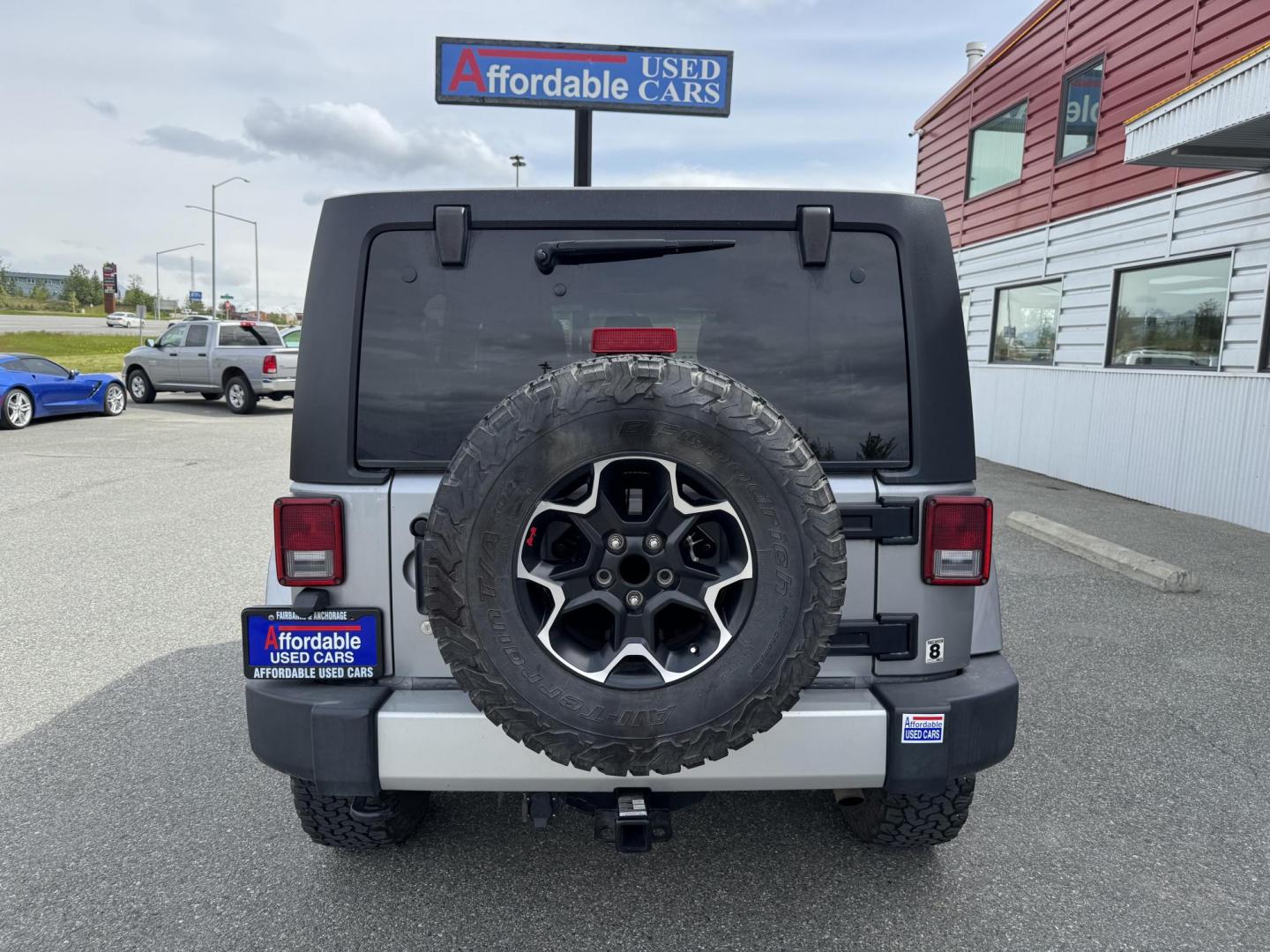 2013 SILVER Jeep Wrangler Unlimited Sahara 4WD (1C4HJWEG5DL) with an 3.6L V6 DOHC 24V FFV engine, Automatic transmission, located at 1960 Industrial Drive, Wasilla, 99654, (907) 274-2277, 61.573475, -149.400146 - Photo#2