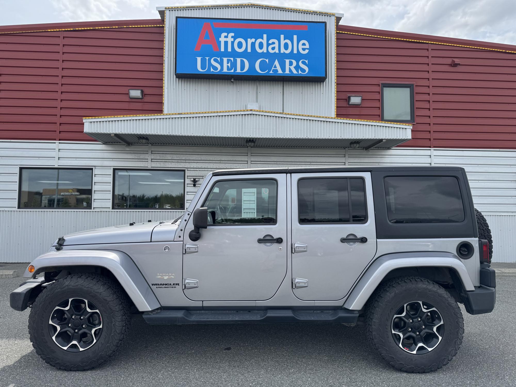 photo of 2013 Jeep Wrangler Unlimited Sahara 4WD
