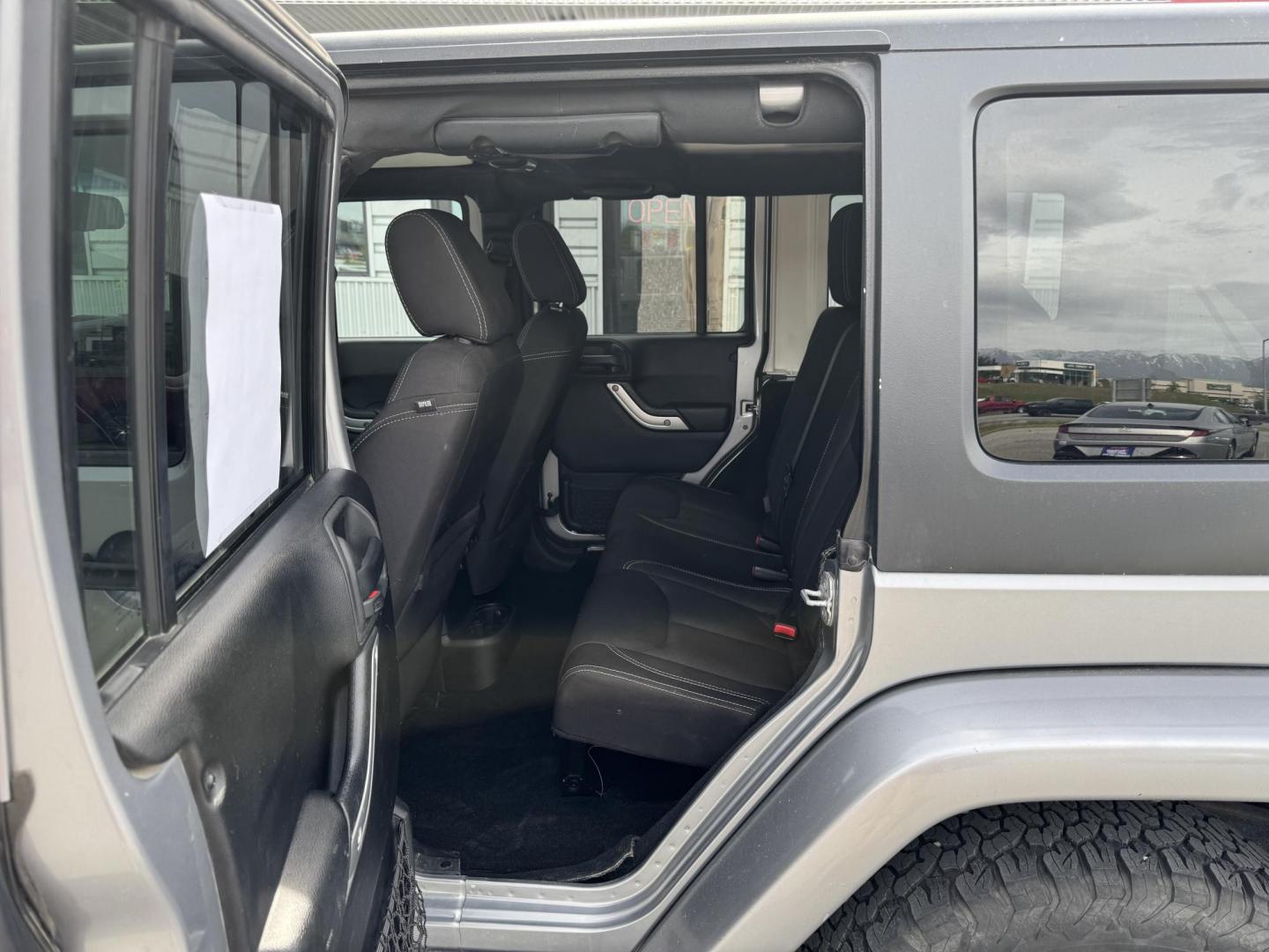 2013 SILVER Jeep Wrangler Unlimited Sahara 4WD (1C4HJWEG5DL) with an 3.6L V6 DOHC 24V FFV engine, Automatic transmission, located at 1960 Industrial Drive, Wasilla, 99654, (907) 274-2277, 61.573475, -149.400146 - Photo#12