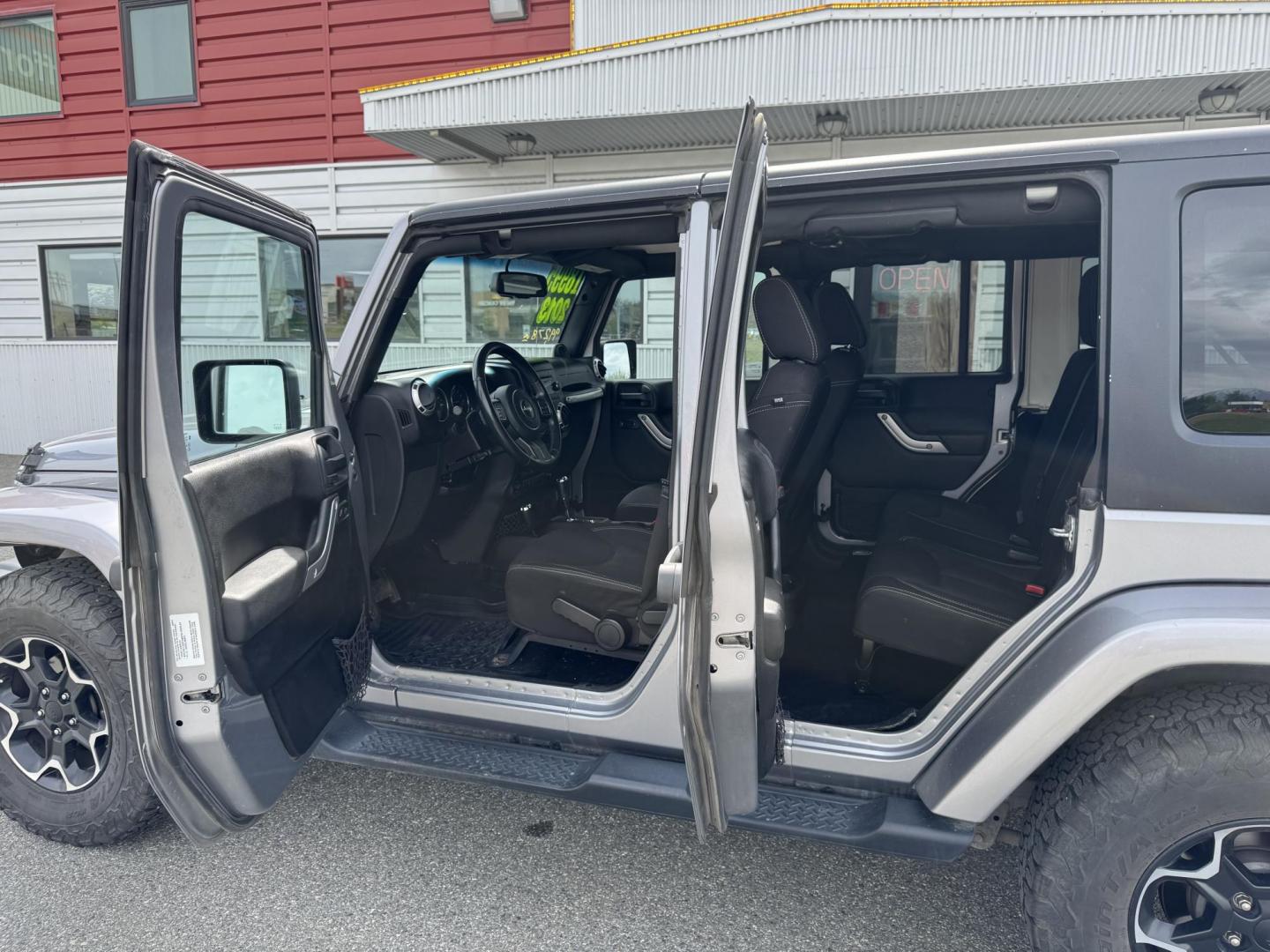 2013 SILVER Jeep Wrangler Unlimited Sahara 4WD (1C4HJWEG5DL) with an 3.6L V6 DOHC 24V FFV engine, Automatic transmission, located at 1960 Industrial Drive, Wasilla, 99654, (907) 274-2277, 61.573475, -149.400146 - Photo#14