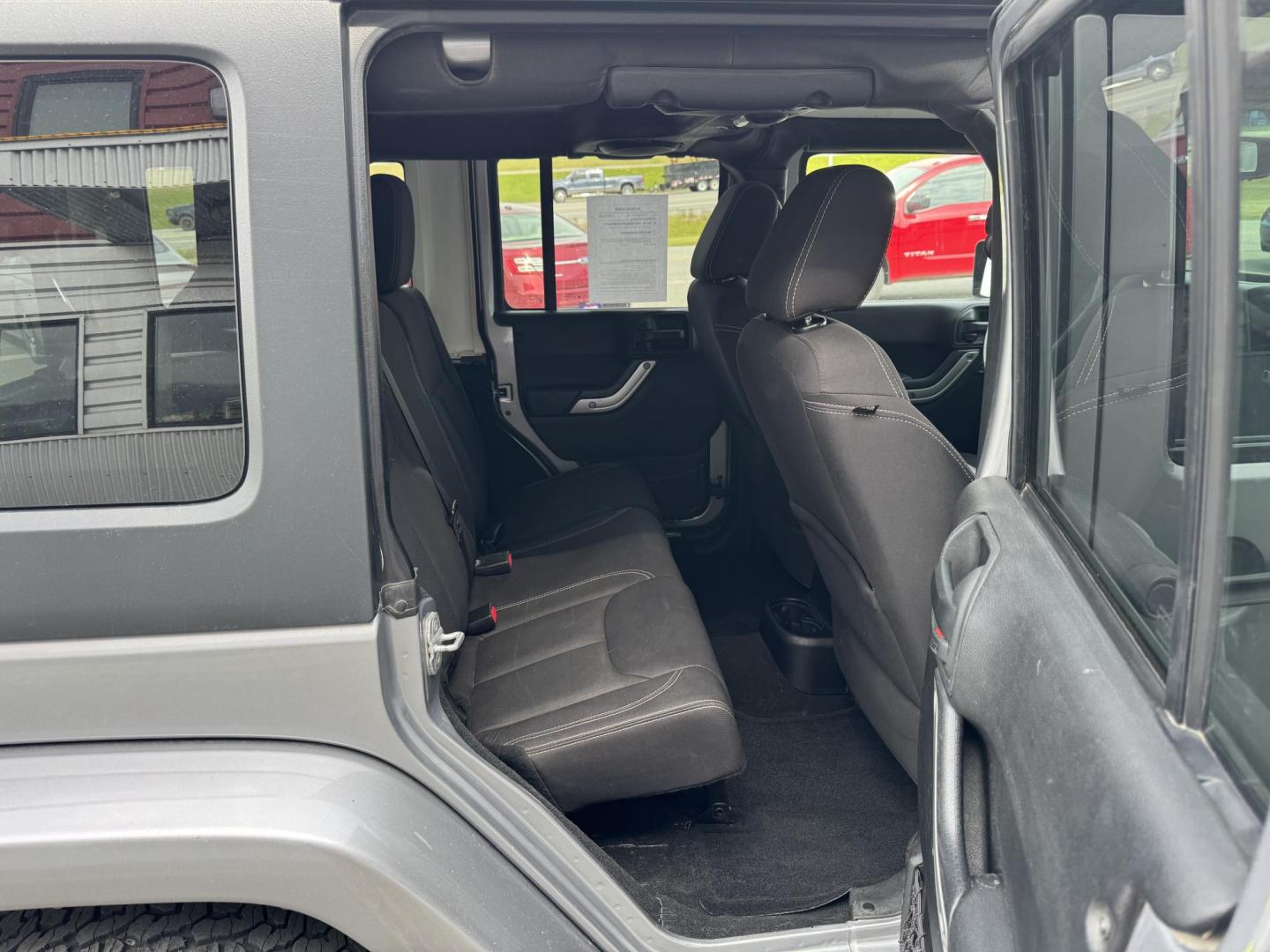 2013 SILVER Jeep Wrangler Unlimited Sahara 4WD (1C4HJWEG5DL) with an 3.6L V6 DOHC 24V FFV engine, Automatic transmission, located at 1960 Industrial Drive, Wasilla, 99654, (907) 274-2277, 61.573475, -149.400146 - Photo#15
