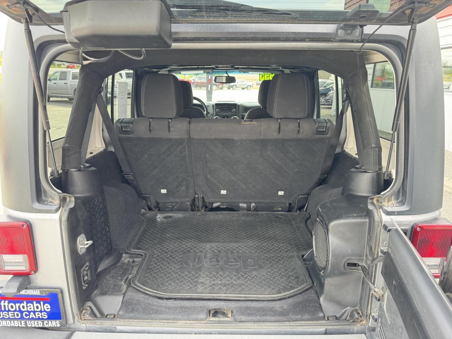 2013 SILVER Jeep Wrangler Unlimited Sahara 4WD (1C4HJWEG5DL) with an 3.6L V6 DOHC 24V FFV engine, Automatic transmission, located at 1960 Industrial Drive, Wasilla, 99654, (907) 274-2277, 61.573475, -149.400146 - Photo#18
