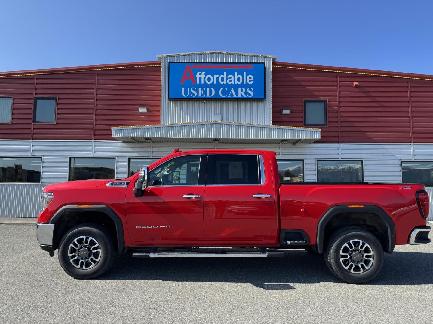 2022 RED GMC SIERRA 2500 SLT (1GT49NE76NF) with an 6.6L engine, Automatic transmission, located at 1960 Industrial Drive, Wasilla, 99654, (907) 274-2277, 61.573475, -149.400146 - Photo#0