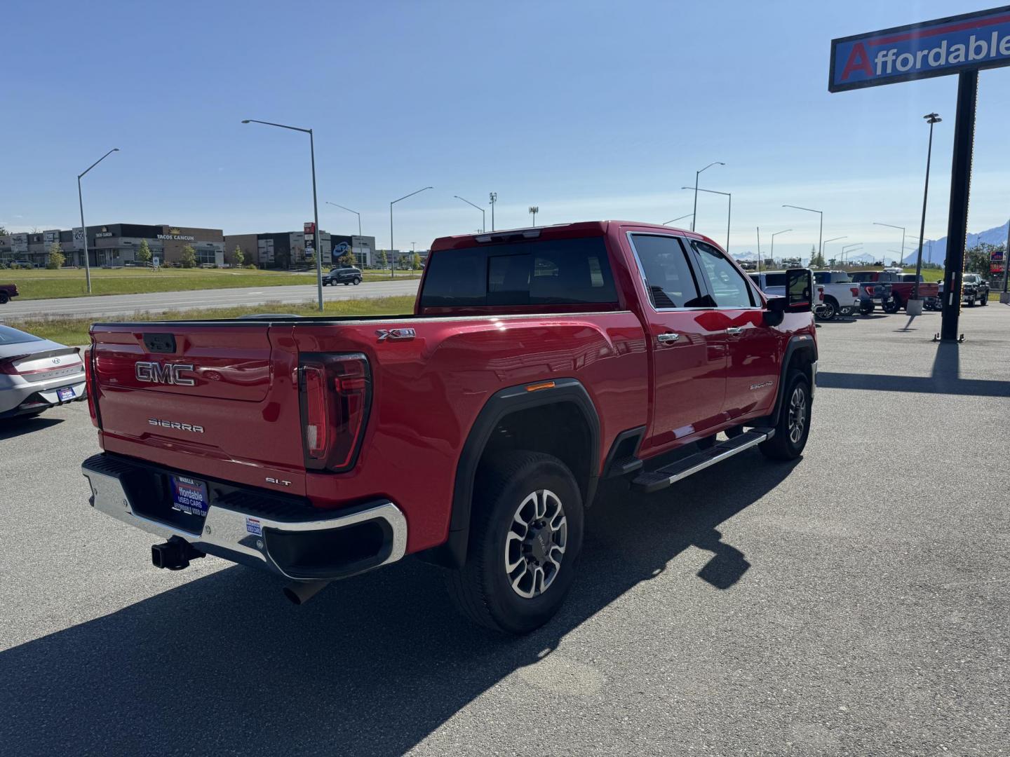2022 RED GMC SIERRA 2500 SLT (1GT49NE76NF) with an 6.6L engine, Automatic transmission, located at 1960 Industrial Drive, Wasilla, 99654, (907) 274-2277, 61.573475, -149.400146 - Photo#3