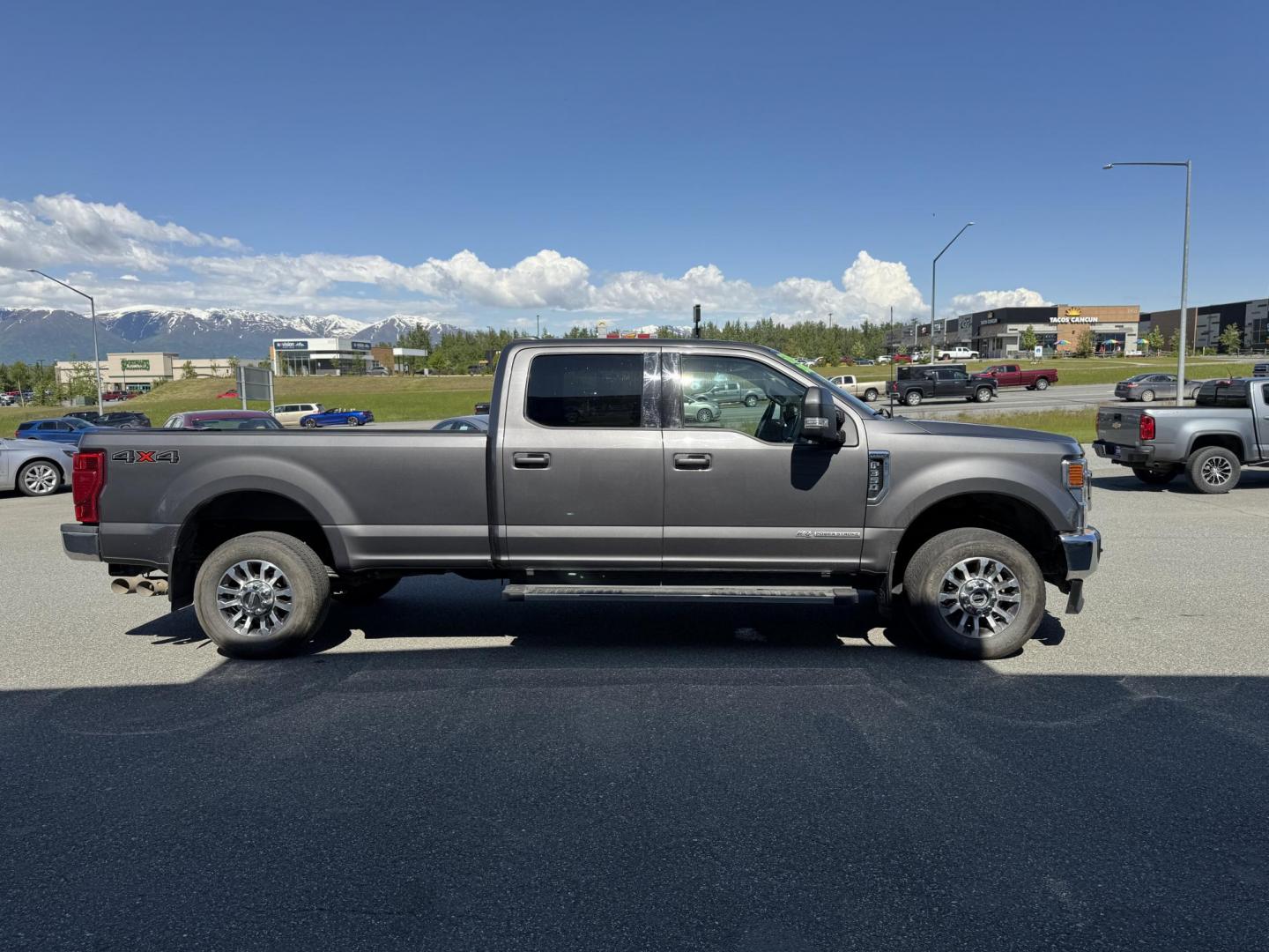 2022 GRAY Ford F-350 SD Lariet Crew Cab Long Bed 4WD (1FT8W3BT1NE) with an 6.7L V8 OHV 16V DIESEL engine, 6A transmission, located at 1960 Industrial Drive, Wasilla, 99654, (907) 274-2277, 61.573475, -149.400146 - Photo#4