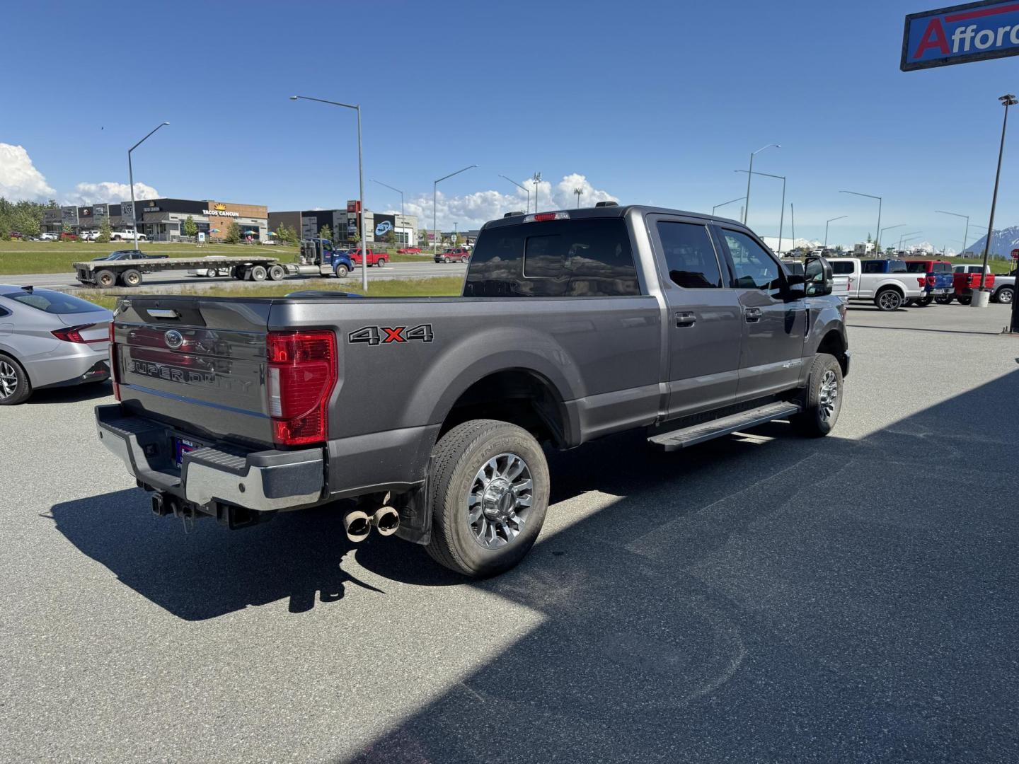 2022 GRAY Ford F-350 SD Lariet Crew Cab Long Bed 4WD (1FT8W3BT1NE) with an 6.7L V8 OHV 16V DIESEL engine, 6A transmission, located at 1960 Industrial Drive, Wasilla, 99654, (907) 274-2277, 61.573475, -149.400146 - Photo#3
