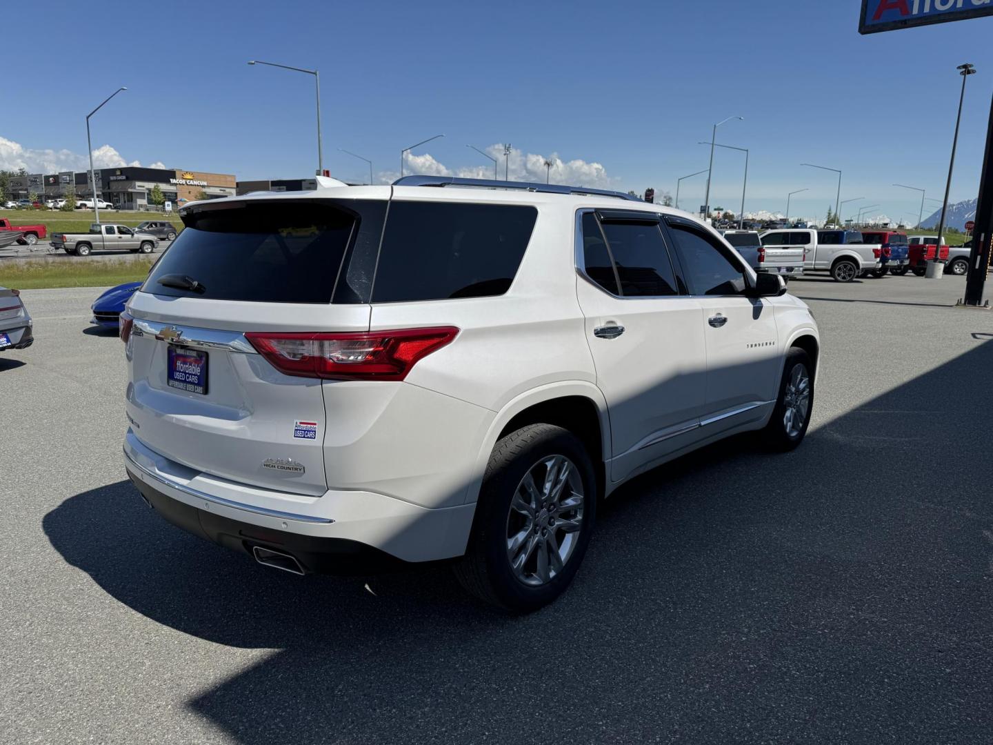 2021 WHITE Chevrolet Traverse High Country AWD (1GNEVNKW3MJ) with an 3.6L V6 DOHC 24V engine, 9A transmission, located at 1960 Industrial Drive, Wasilla, 99654, (907) 274-2277, 61.573475, -149.400146 - Photo#3