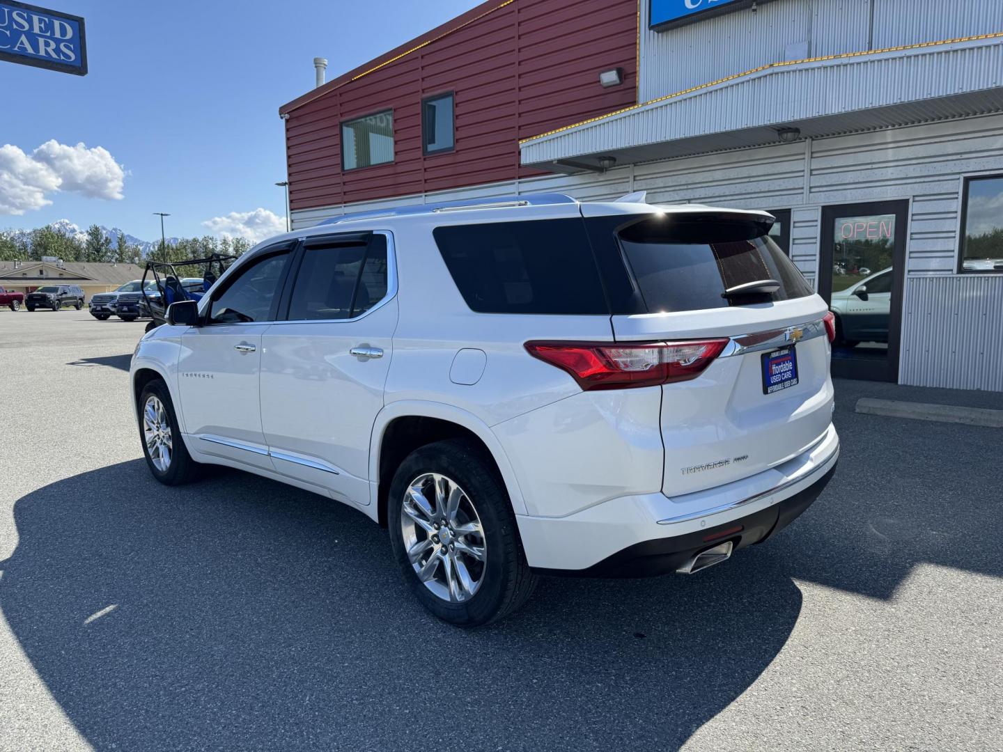 2021 WHITE Chevrolet Traverse High Country AWD (1GNEVNKW3MJ) with an 3.6L V6 DOHC 24V engine, 9A transmission, located at 1960 Industrial Drive, Wasilla, 99654, (907) 274-2277, 61.573475, -149.400146 - Photo#1