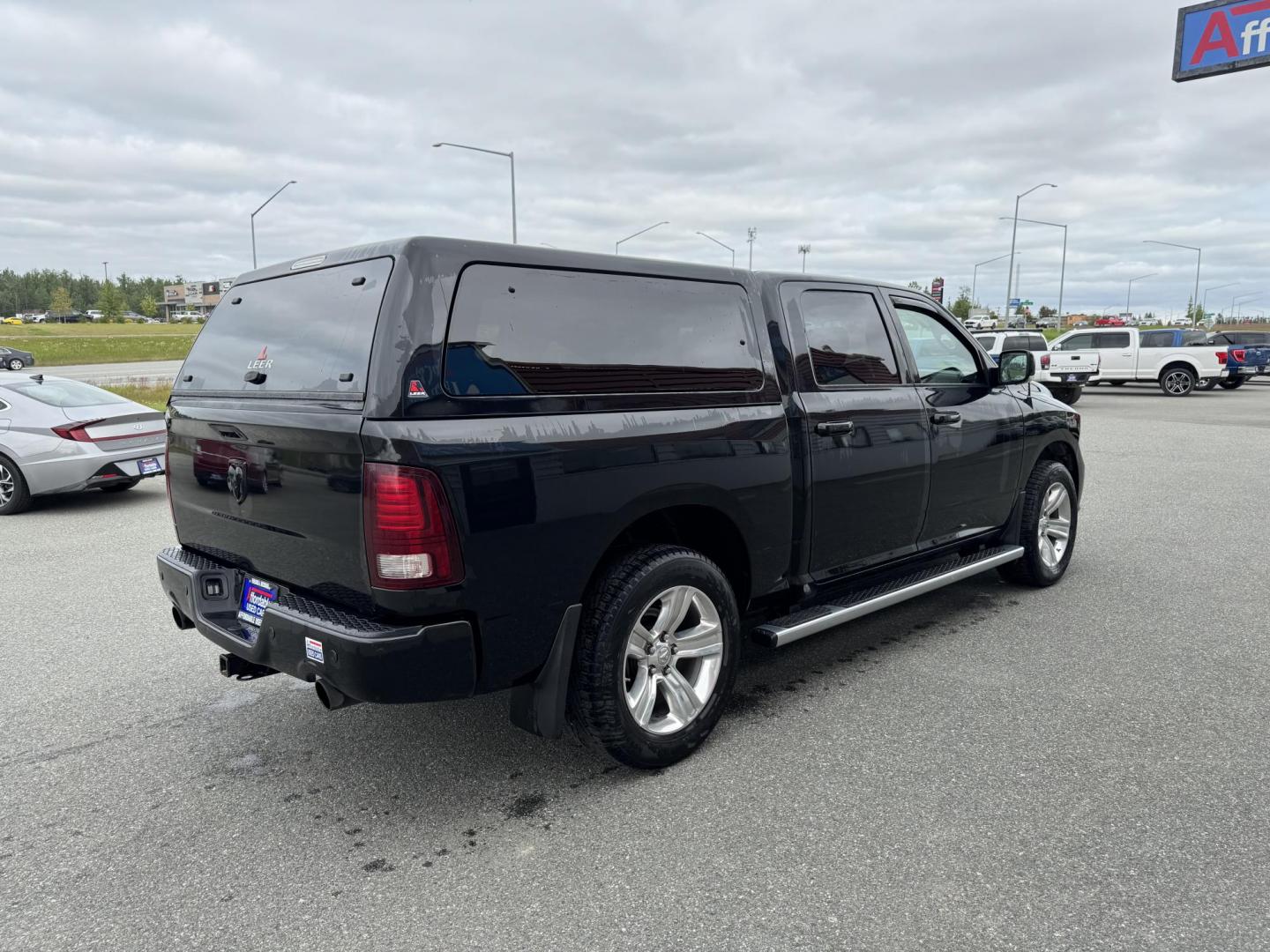 2017 BLACK RAM 1500 Sport Crew Cab SWB 4WD (1C6RR7MT3HS) with an 5.7L V8 OHV 16V engine, 8A transmission, located at 1960 Industrial Drive, Wasilla, 99654, (907) 274-2277, 61.573475, -149.400146 - Photo#2