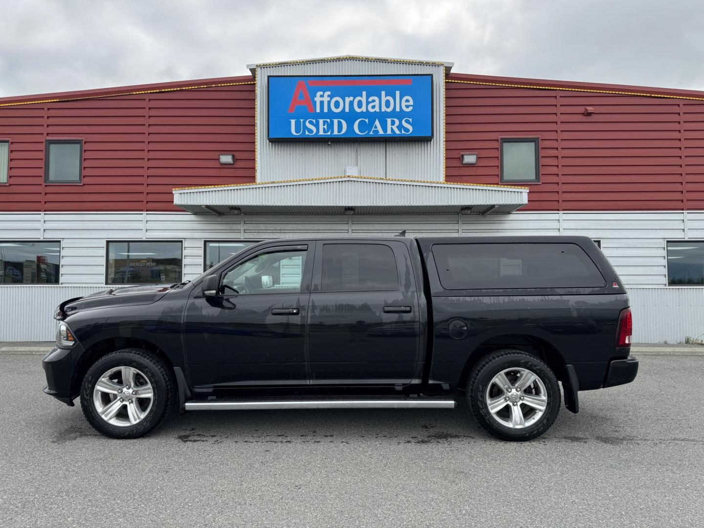 2017 BLACK RAM 1500 Sport Crew Cab SWB 4WD (1C6RR7MT3HS) with an 5.7L V8 OHV 16V engine, 8A transmission, located at 1960 Industrial Drive, Wasilla, 99654, (907) 274-2277, 61.573475, -149.400146 - Photo#0