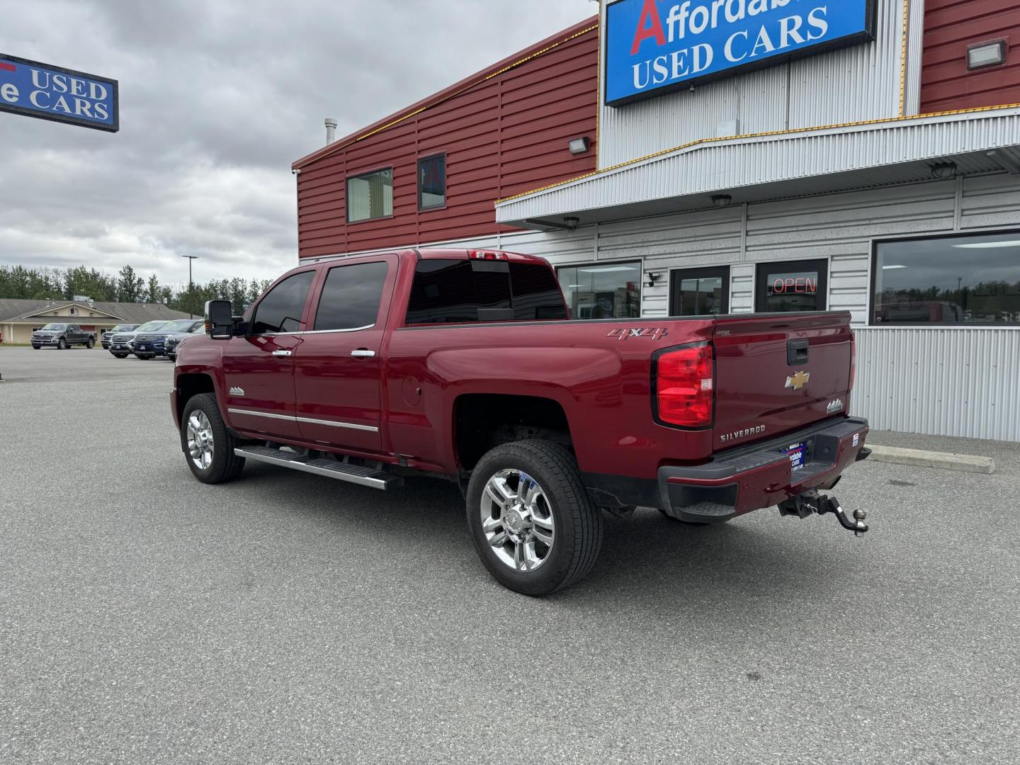 2018 RED Chevrolet Silverado 2500HD High Country Crew Cab 4WD (1GC1KXEG5JF) with an 6.0L V8 OHV 16V FFV engine, 6A transmission, located at 1960 Industrial Drive, Wasilla, 99654, (907) 274-2277, 61.573475, -149.400146 - Photo#1