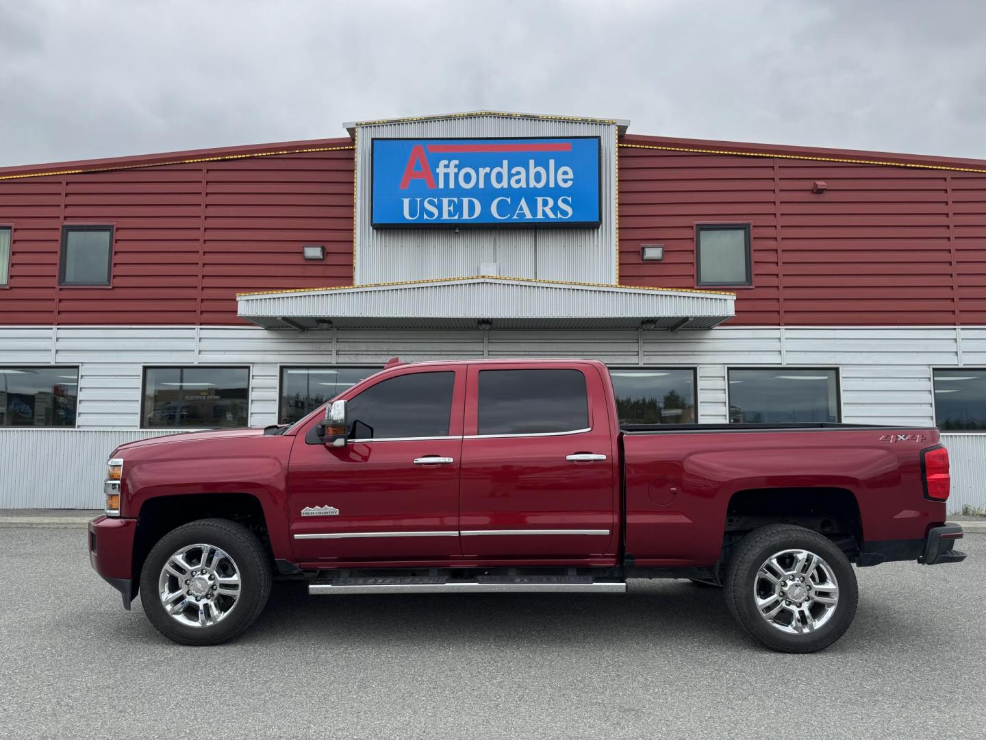 2018 RED Chevrolet Silverado 2500HD High Country Crew Cab 4WD (1GC1KXEG5JF) with an 6.0L V8 OHV 16V FFV engine, 6A transmission, located at 1960 Industrial Drive, Wasilla, 99654, (907) 274-2277, 61.573475, -149.400146 - Photo#0