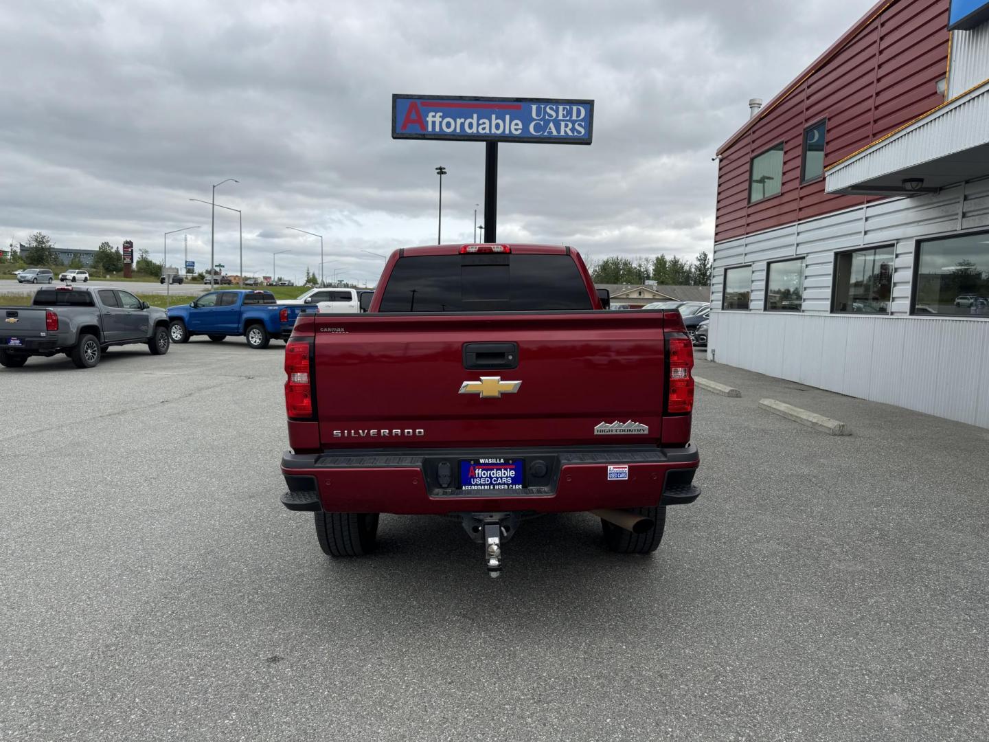 2018 RED Chevrolet Silverado 2500HD High Country Crew Cab 4WD (1GC1KXEG5JF) with an 6.0L V8 OHV 16V FFV engine, 6A transmission, located at 1960 Industrial Drive, Wasilla, 99654, (907) 274-2277, 61.573475, -149.400146 - Photo#2