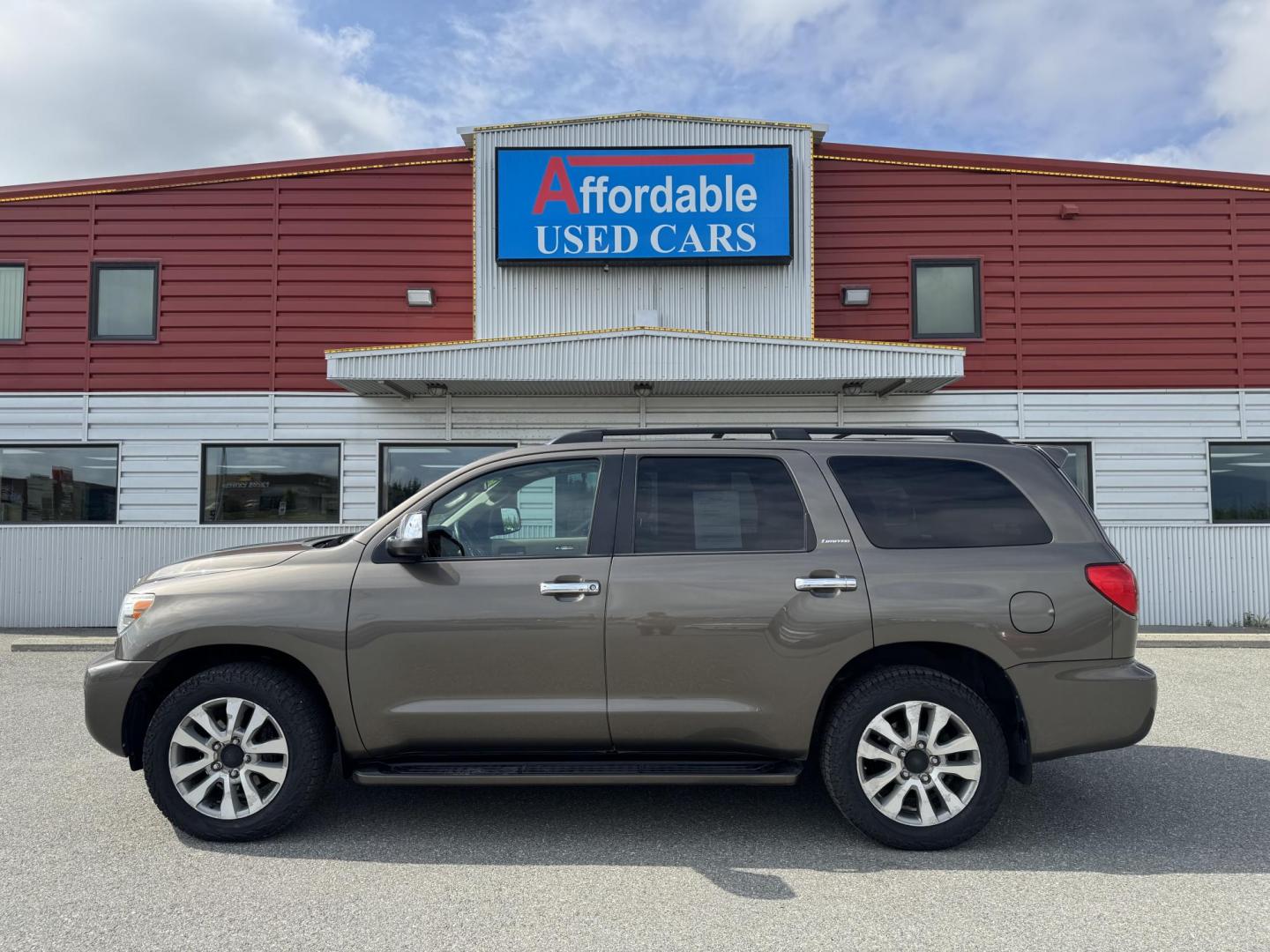2016 GREEN Toyota Sequoia Limited 4WD (5TDJY5G11GS) with an 5.7L V8 DOHC 32V engine, 6A transmission, located at 1960 Industrial Drive, Wasilla, 99654, (907) 274-2277, 61.573475, -149.400146 - Photo#0