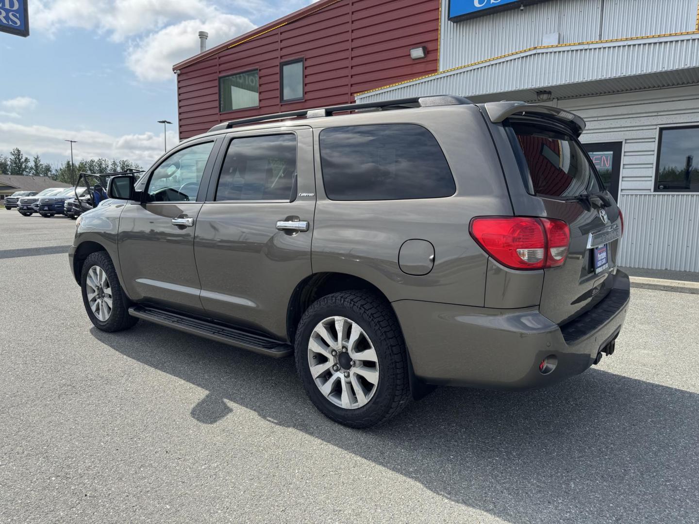 2016 GREEN Toyota Sequoia Limited 4WD (5TDJY5G11GS) with an 5.7L V8 DOHC 32V engine, 6A transmission, located at 1960 Industrial Drive, Wasilla, 99654, (907) 274-2277, 61.573475, -149.400146 - Photo#1