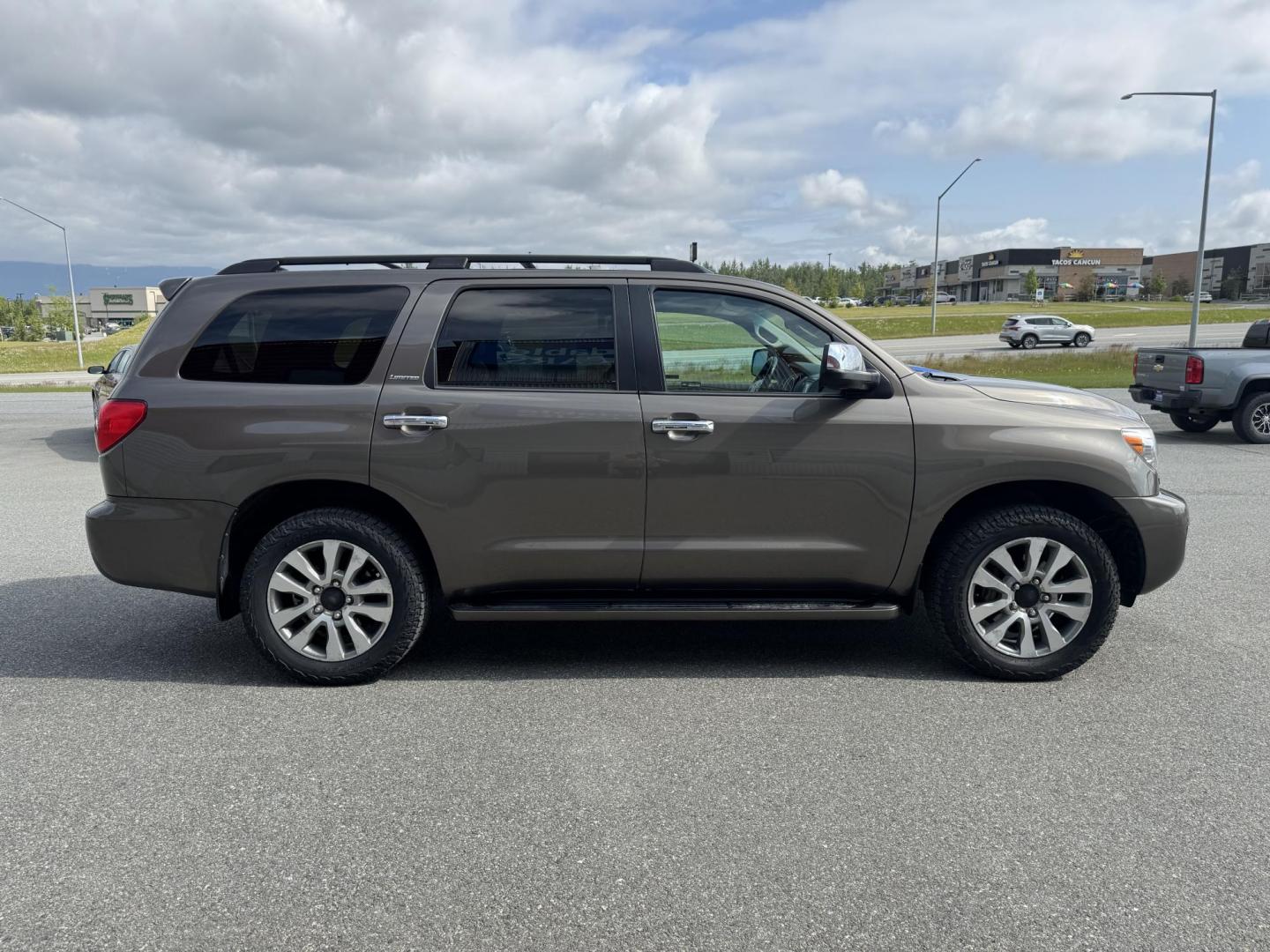 2016 GREEN Toyota Sequoia Limited 4WD (5TDJY5G11GS) with an 5.7L V8 DOHC 32V engine, 6A transmission, located at 1960 Industrial Drive, Wasilla, 99654, (907) 274-2277, 61.573475, -149.400146 - Photo#4