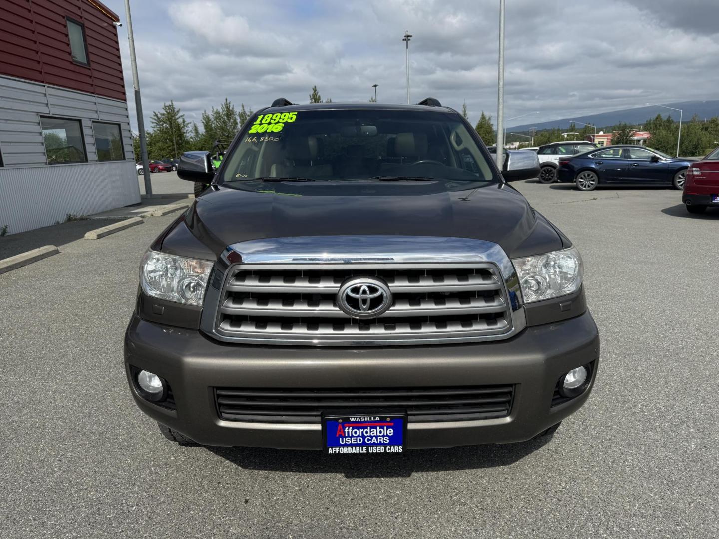 2016 GREEN Toyota Sequoia Limited 4WD (5TDJY5G11GS) with an 5.7L V8 DOHC 32V engine, 6A transmission, located at 1960 Industrial Drive, Wasilla, 99654, (907) 274-2277, 61.573475, -149.400146 - Photo#6