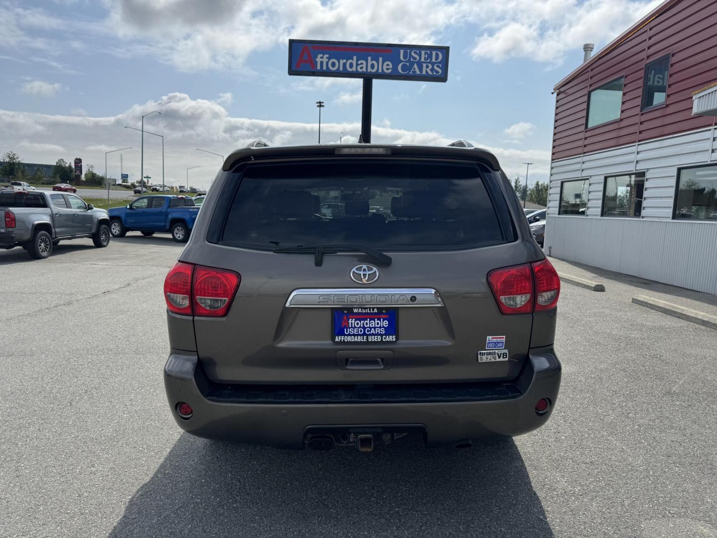 2016 GREEN Toyota Sequoia Limited 4WD (5TDJY5G11GS) with an 5.7L V8 DOHC 32V engine, 6A transmission, located at 1960 Industrial Drive, Wasilla, 99654, (907) 274-2277, 61.573475, -149.400146 - Photo#2