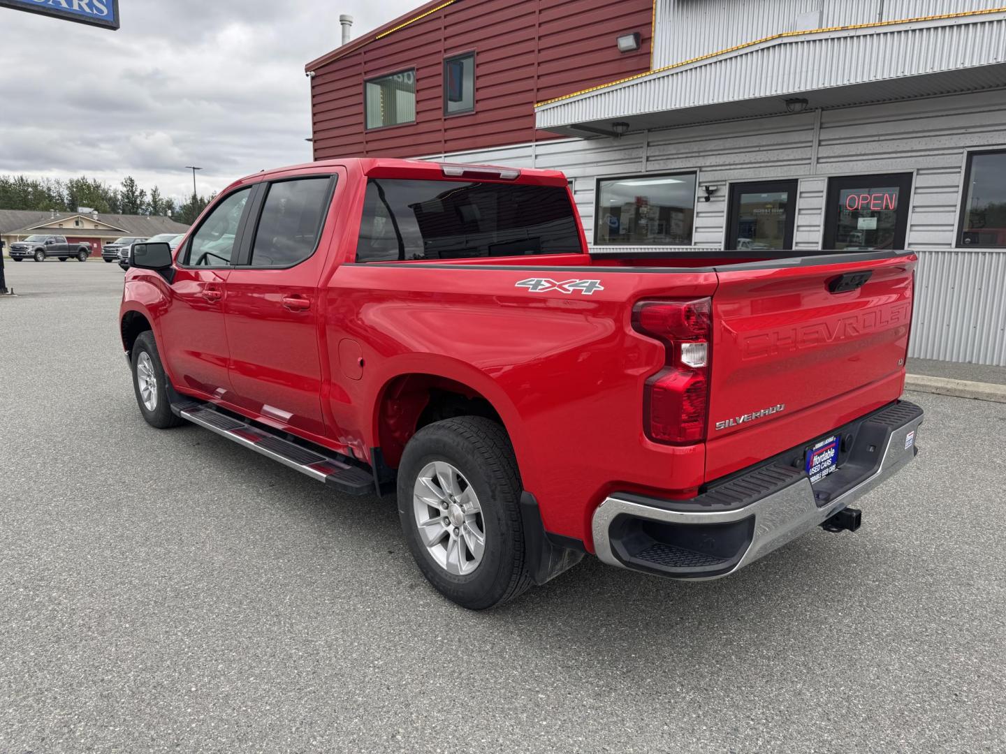 2023 RED Chevrolet Silverado 1500 LT Crew Cab 4WD (1GCUDDED4PZ) with an 5.3L V8 OHV 16V engine, 6A transmission, located at 1960 Industrial Drive, Wasilla, 99654, (907) 274-2277, 61.573475, -149.400146 - Photo#1