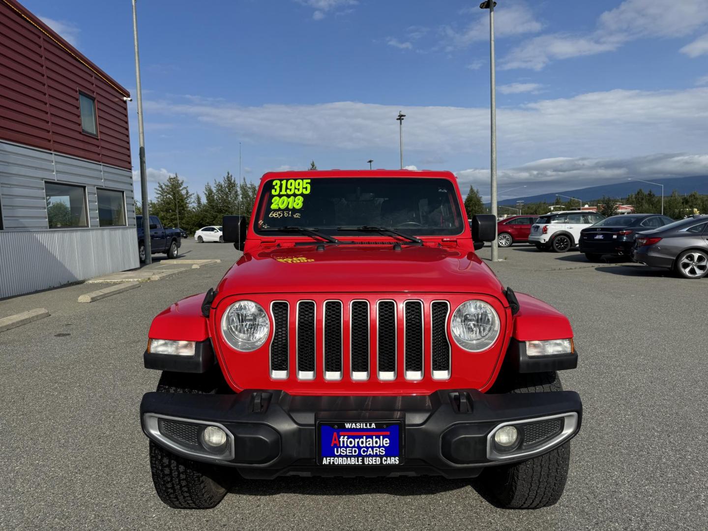 2018 RED Jeep Wrangler JK Unlimited Sahara (1C4HJXEG6JW) with an 3.6L V6 DOHC 24V FFV engine, 6A transmission, located at 1960 Industrial Drive, Wasilla, 99654, (907) 274-2277, 61.573475, -149.400146 - Photo#6