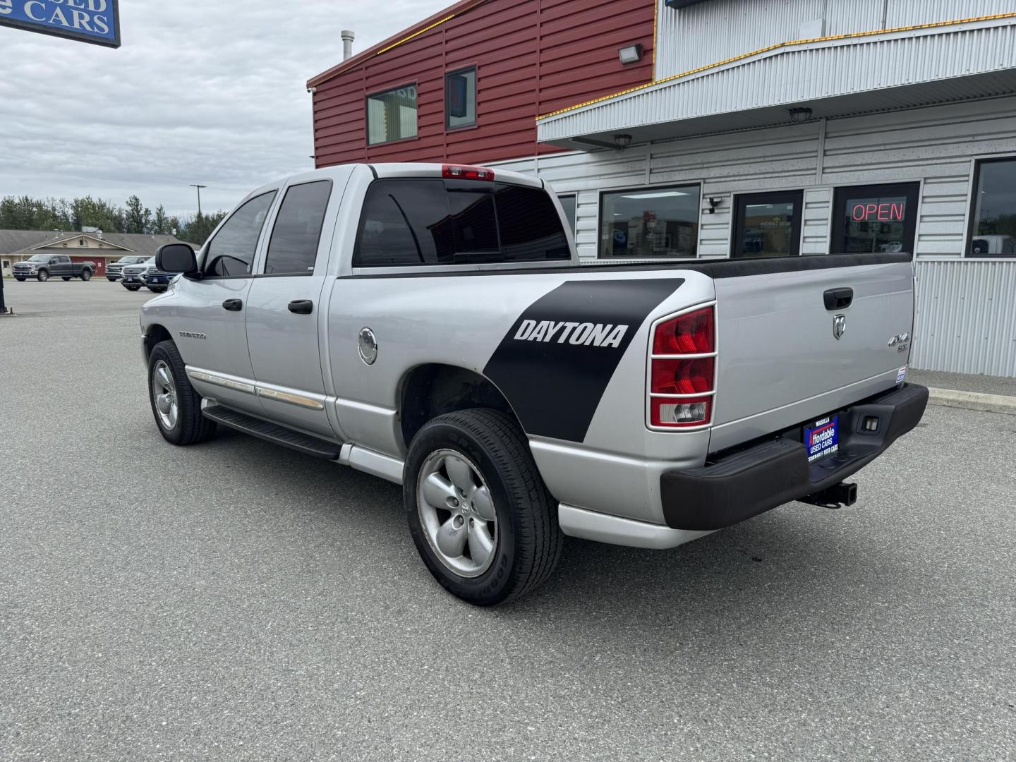 2005 SILVER Dodge Ram 1500 Quad Cab Daytona 4WD (1D7HU18D05J) with an 5.7L V8 OHV 16V engine, 5-Speed Automatic Overdrive transmission, located at 1960 Industrial Drive, Wasilla, 99654, (907) 274-2277, 61.573475, -149.400146 - Photo#1