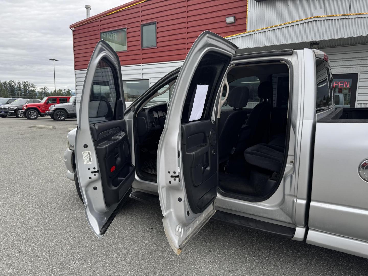 2005 SILVER Dodge Ram 1500 Quad Cab Daytona 4WD (1D7HU18D05J) with an 5.7L V8 OHV 16V engine, 5-Speed Automatic Overdrive transmission, located at 1960 Industrial Drive, Wasilla, 99654, (907) 274-2277, 61.573475, -149.400146 - Photo#13