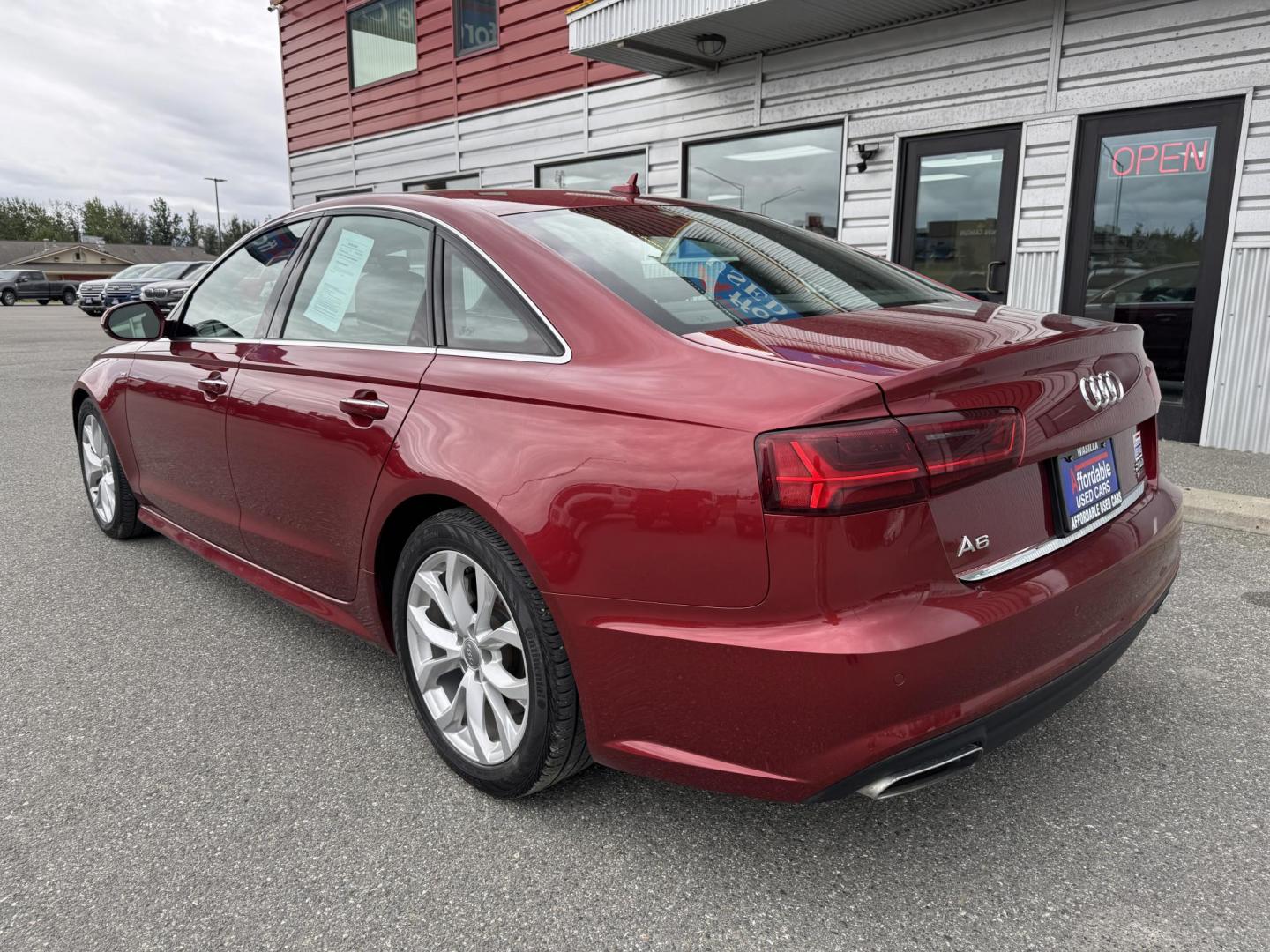 2018 RED Audi A6 2.0T Premium Plus quattro (WAUG8BFC2JN) with an 2.0L L4 DOHC 16V engine, 8A transmission, located at 1960 Industrial Drive, Wasilla, 99654, (907) 274-2277, 61.573475, -149.400146 - Photo#1