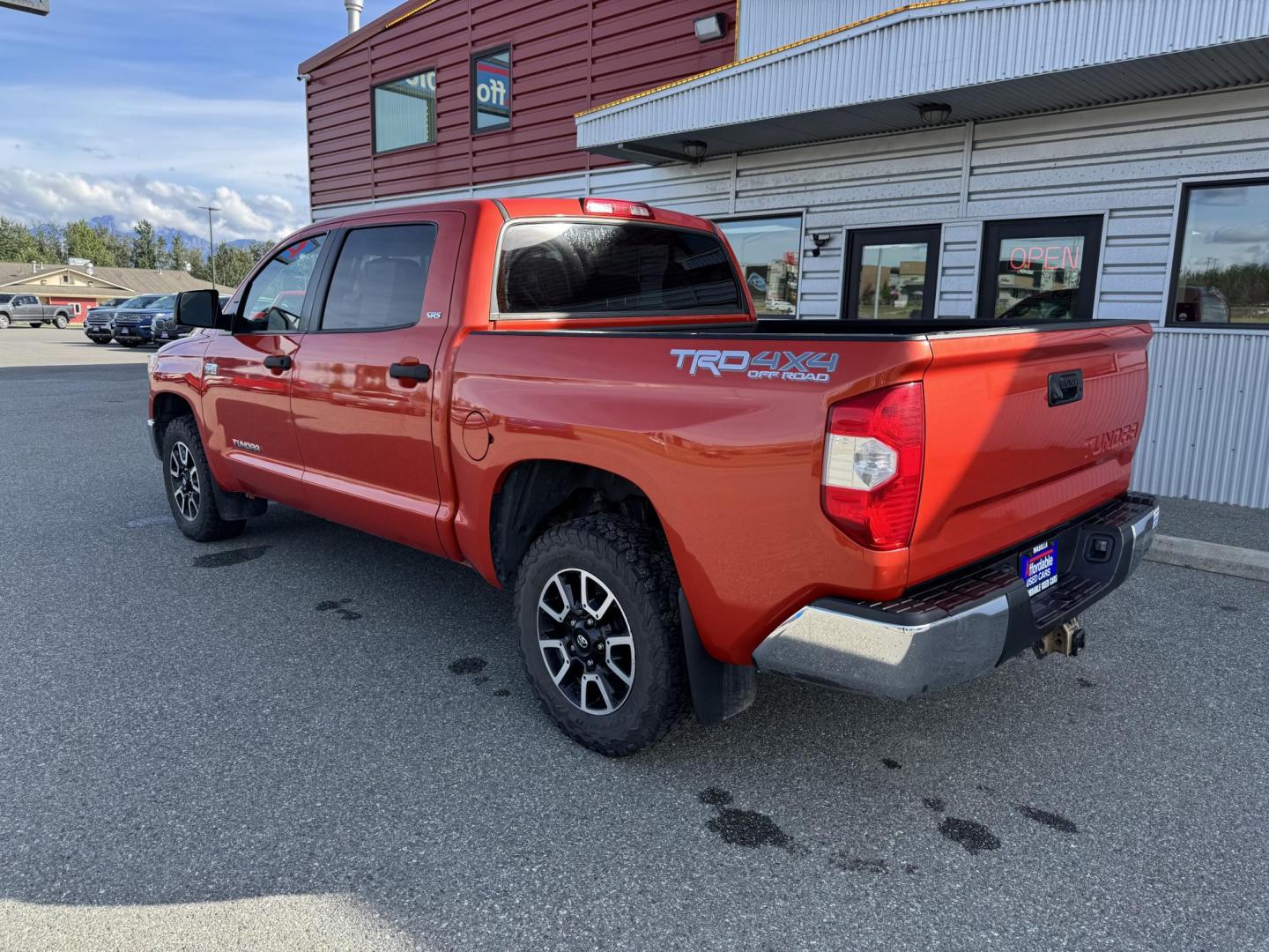 2017 Orange Toyota Tundra SR5 5.7L V8 CrewMax TRD Off Road 4WD (5TFDY5F19HX) with an 5.7L V8 DOHC 32V engine, 6A transmission, located at 1960 Industrial Drive, Wasilla, 99654, (907) 274-2277, 61.573475, -149.400146 - Photo#1