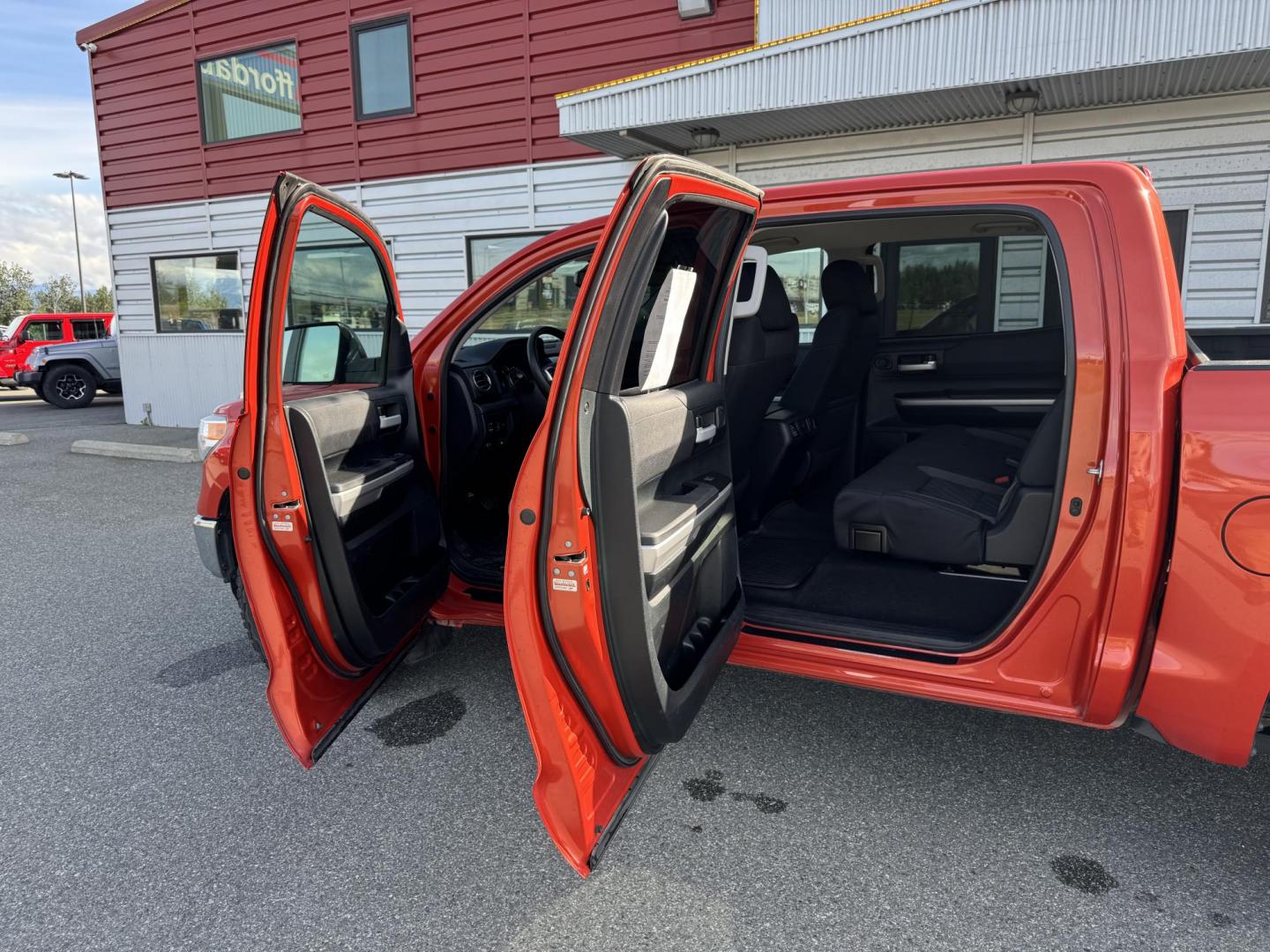 2017 Orange Toyota Tundra SR5 5.7L V8 CrewMax TRD Off Road 4WD (5TFDY5F19HX) with an 5.7L V8 DOHC 32V engine, 6A transmission, located at 1960 Industrial Drive, Wasilla, 99654, (907) 274-2277, 61.573475, -149.400146 - Photo#13