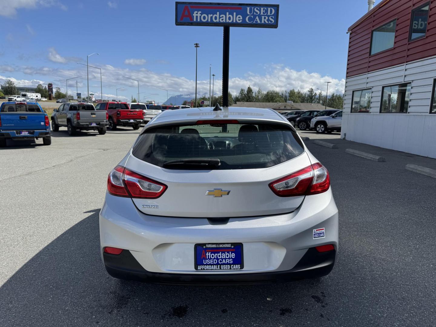 2019 SILVER Chevrolet Cruze LS Hatchback (3G1BC6SM9KS) with an 1.4L L4 DOHC 16V TURBO engine, 6A transmission, located at 1960 Industrial Drive, Wasilla, 99654, (907) 274-2277, 61.573475, -149.400146 - Photo#2