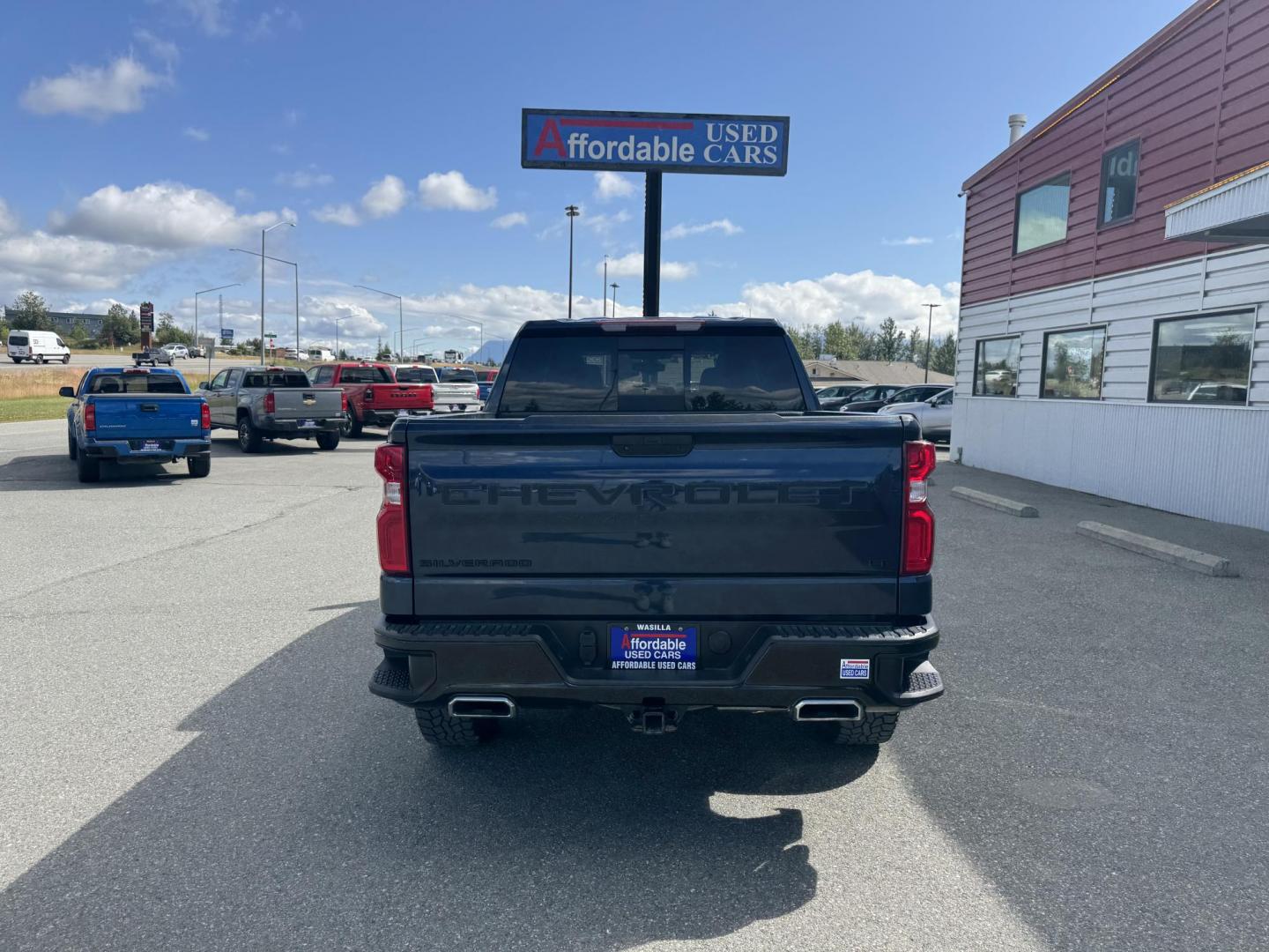 2020 BLUE Chevrolet Silverado 1500 LT Trail Boss Crew Cab 4WD (3GCPYFED2LG) with an 5.3L V8 OHV 16V engine, 6A transmission, located at 1960 Industrial Drive, Wasilla, 99654, (907) 274-2277, 61.573475, -149.400146 - Photo#2