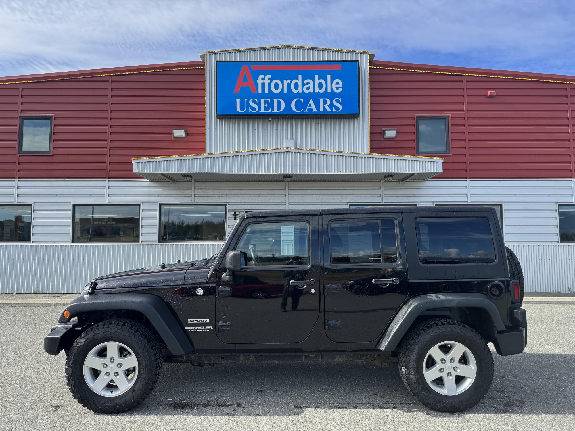 photo of 2014 Jeep Wrangler Unlimited Sport 4WD